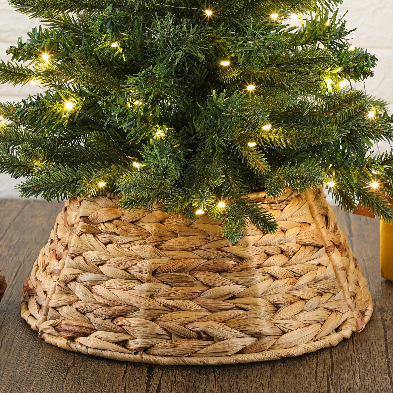 Photo 1 of ****TREE NOT INCLUDED**** Hollowfly Mini Christmas Tree Collar 17inch Small Woven Hyacinth Tree Skirt Rustic Farmhouse Xmas Stand Base Cover for 4ft Boho Christmas Trees Ring for Xmas Decorations