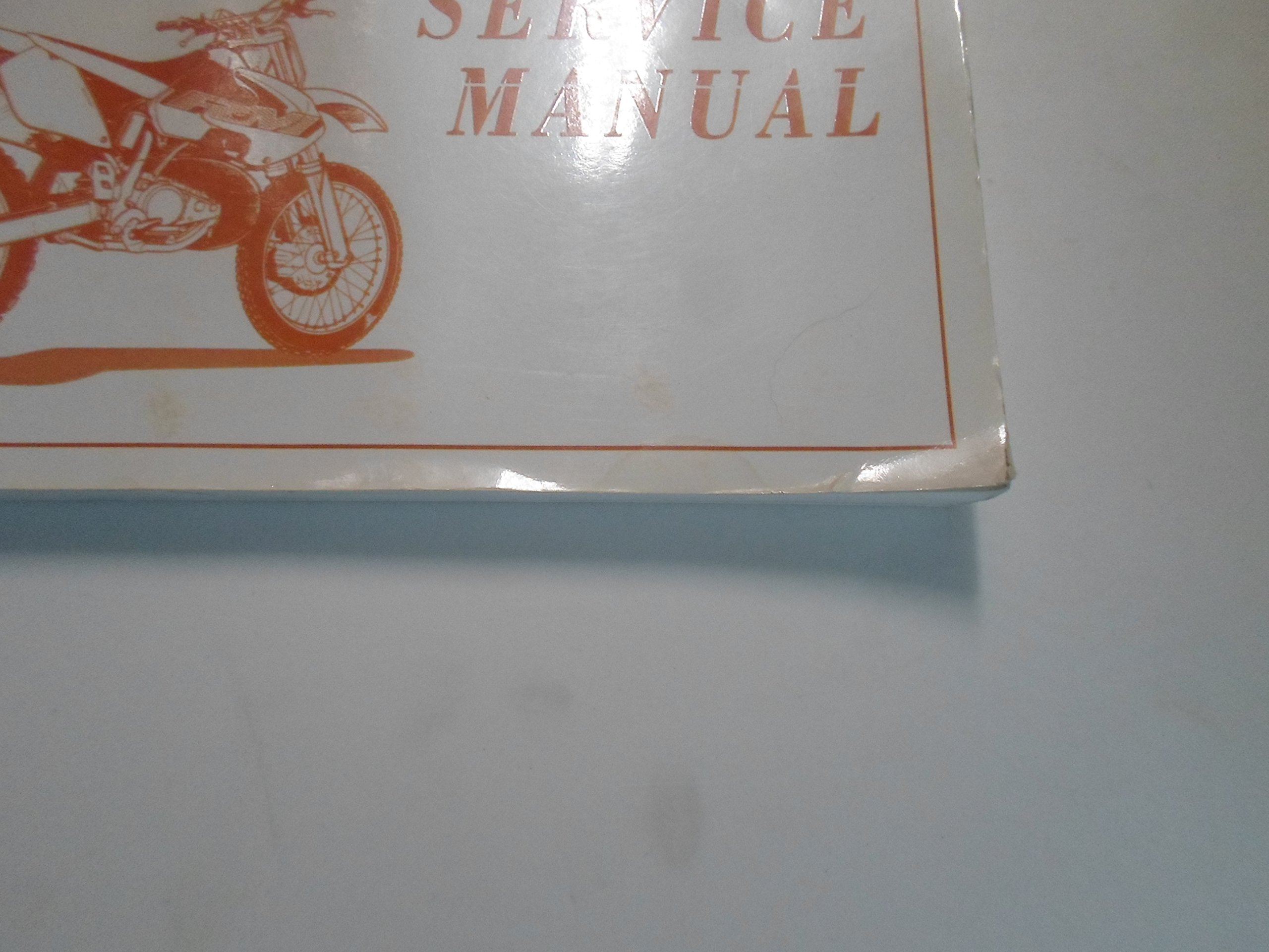 2000 Suzuki RM125 Owners Service Manual MINOR WEAR: Suzuki: Amazon.com:  Books