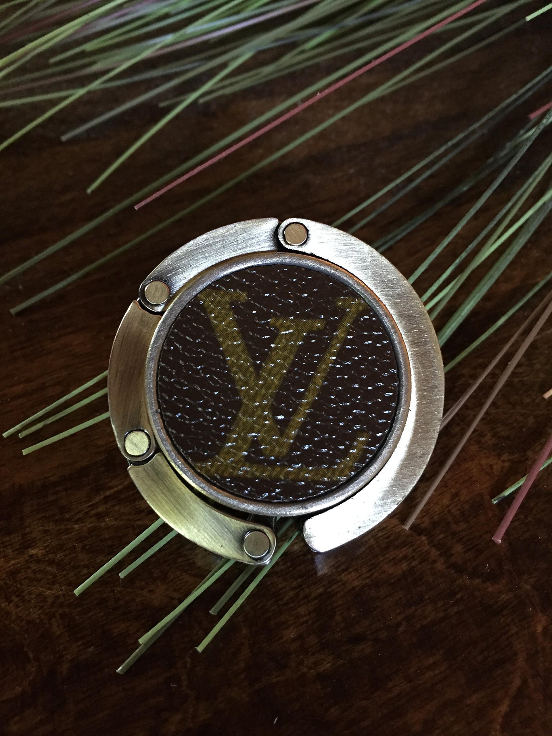 Handcrafted foldable purse hook fashioned with authentic repurposed Louis Vuitton monogram