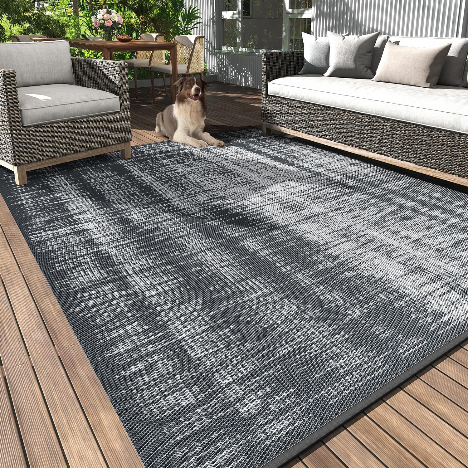 Photo 1 of MontVoo Outdoor Rug Waterproof 5x8 ft Outdoor Carpet Patio Rug Mat Reversible RV Camping Rug Plastic Straw Outside Rug for Balcony Porch Deck Picnic Beach Modern Grey