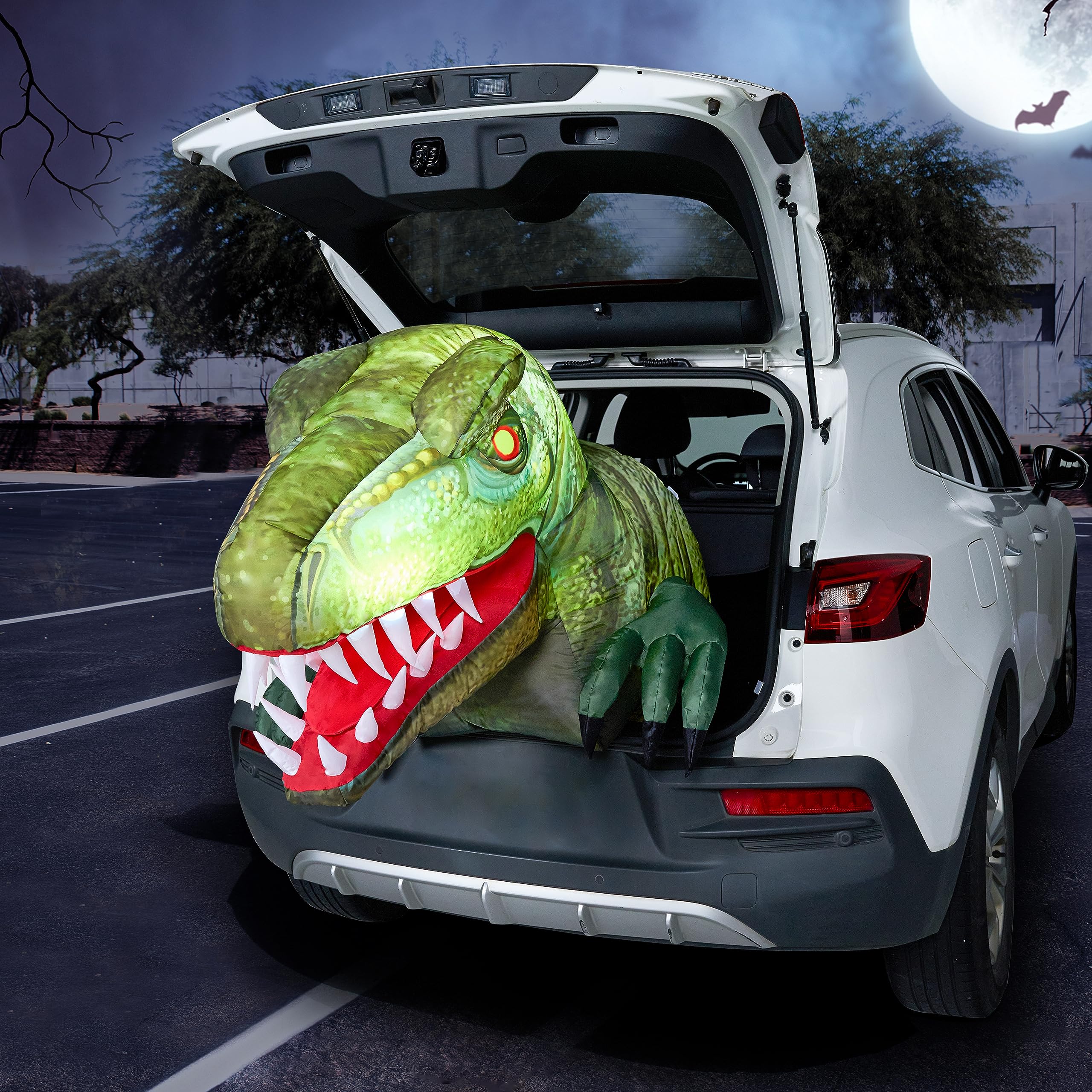 Photo 1 of Joiedomi Animated Halloween Inflatable Outdoor Decorations, Trunk or Treat Car Decorations, Halloween Blow Ups Animated Dinosaur with LEDs for Halloween Decor, Halloween Yard Decoration
