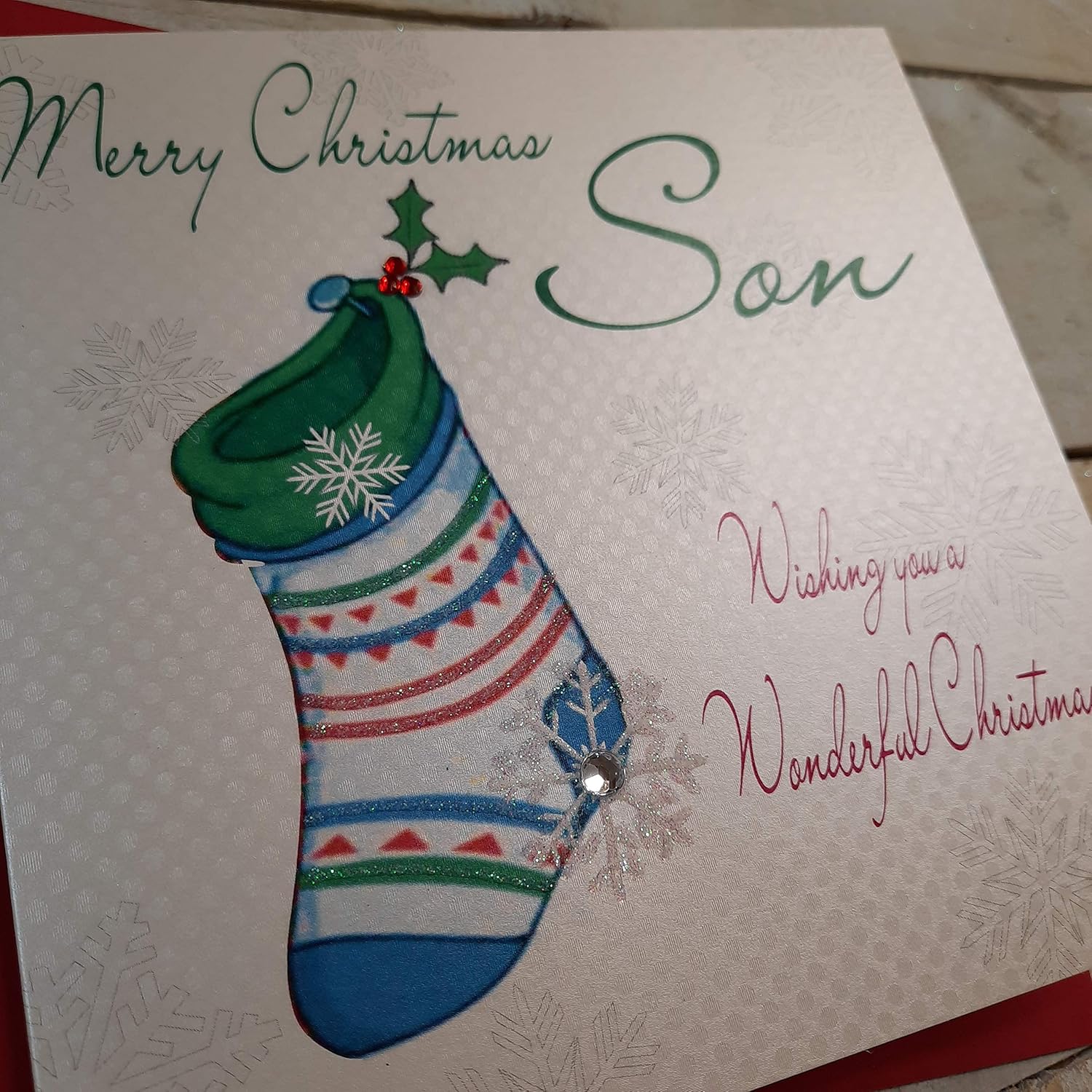 White Cotton Cards Merry Son Handmade Christmas Card (Blue Stocking Code cb17), 16cm x 16cm - Image 3
