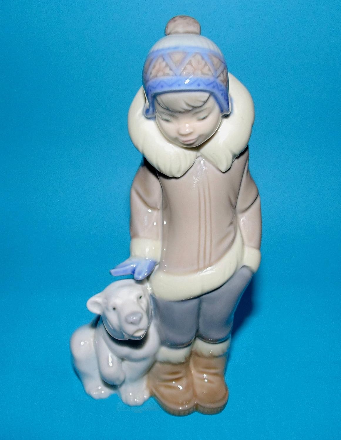 lladro eskimo boy with polar bear cub