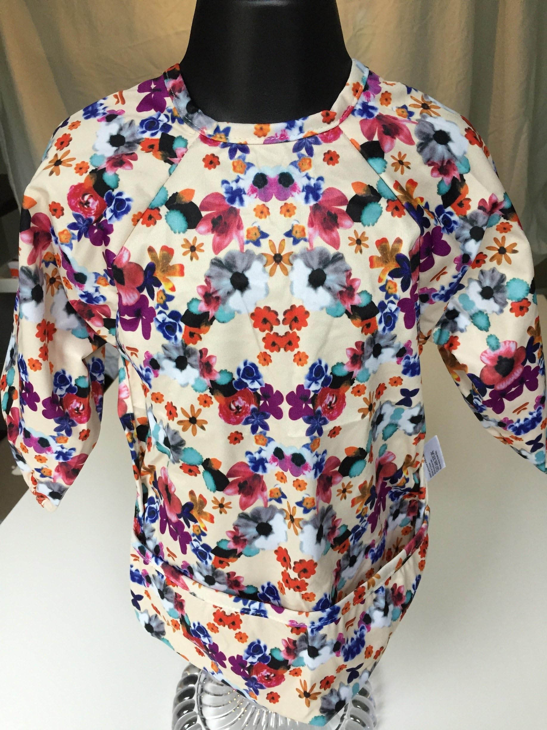 Messy Bibs Feeding Bib – Flowers, Small, Long Sleeved, Waterproof, Breathable, Easy to Clean Baby & Toddler Bibs, for Girls and Boys. Perfect for Feeding and Messy Play. With Adjustable Neck Fastening and Food Catcher Pocket. 6-36 months. Available in 2 Sizes and 8 Great Designs.