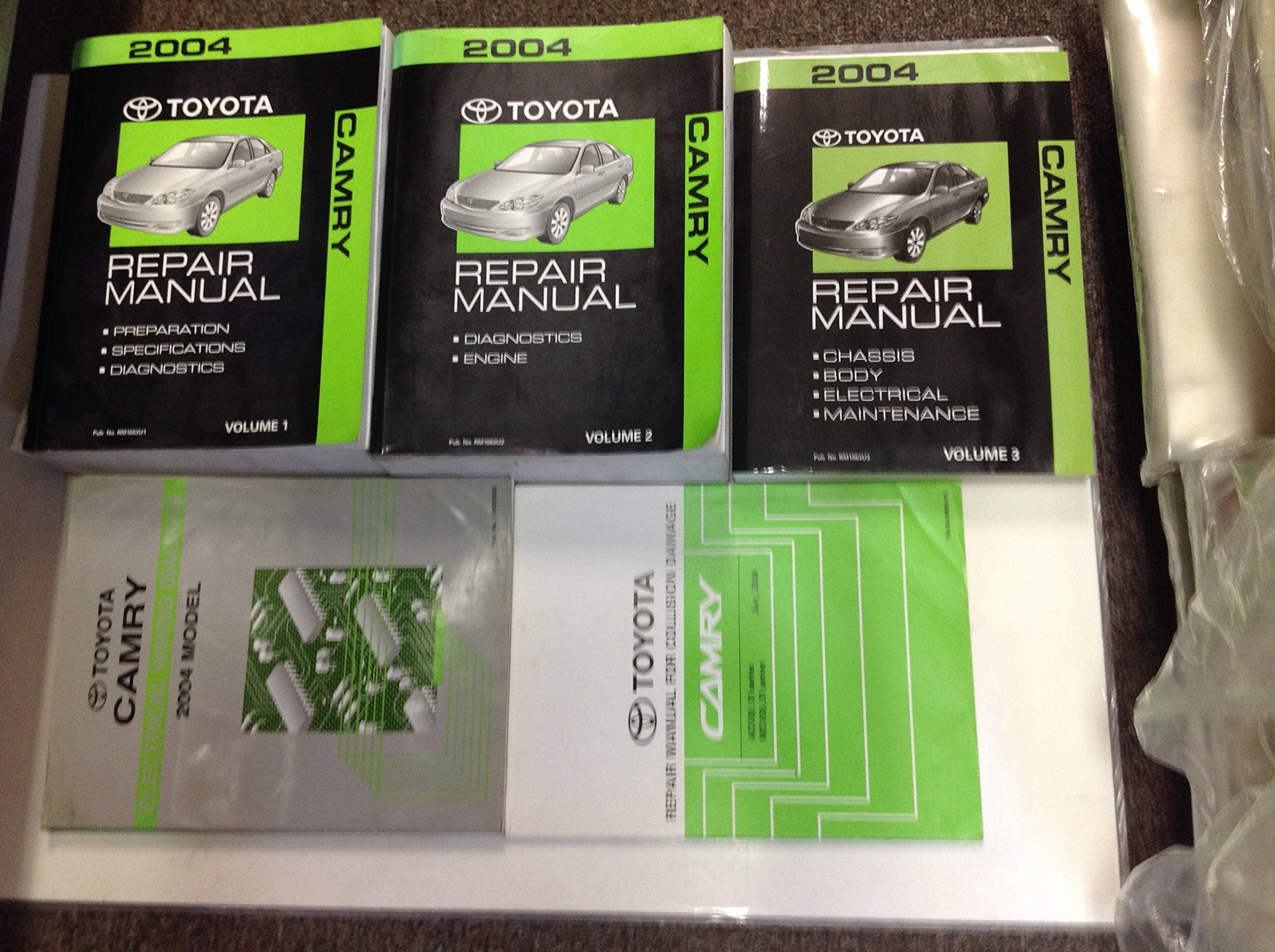 2004 Toyota CAMRY Service Shop Repair Manual Set FACTORY W EWD & Body Book  Paperback – 2004
