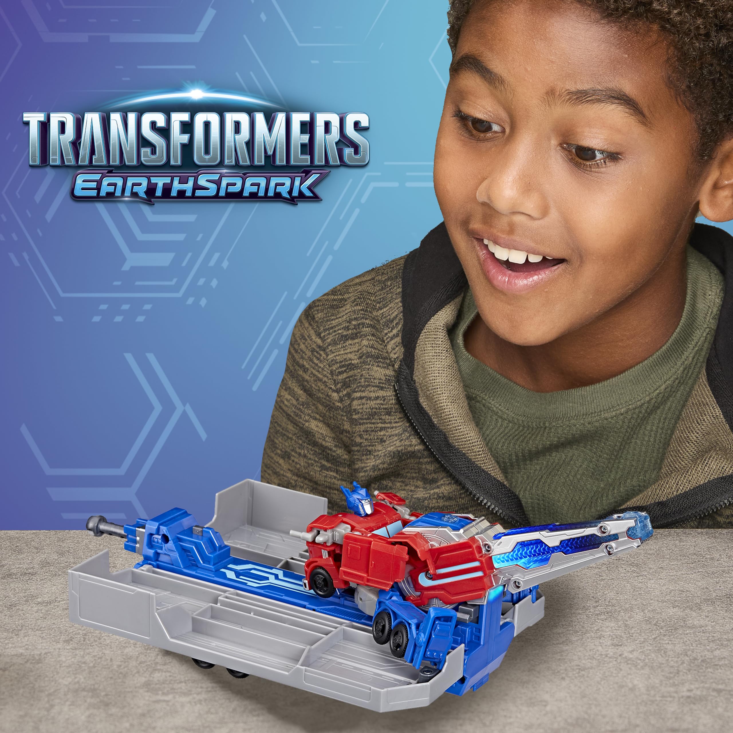 Transformers EarthSpark Optimus Prime Battle Trailer Playset with Action Figure, Lights and Sounds, Electronic Truck Toys for Kids 6 and Up