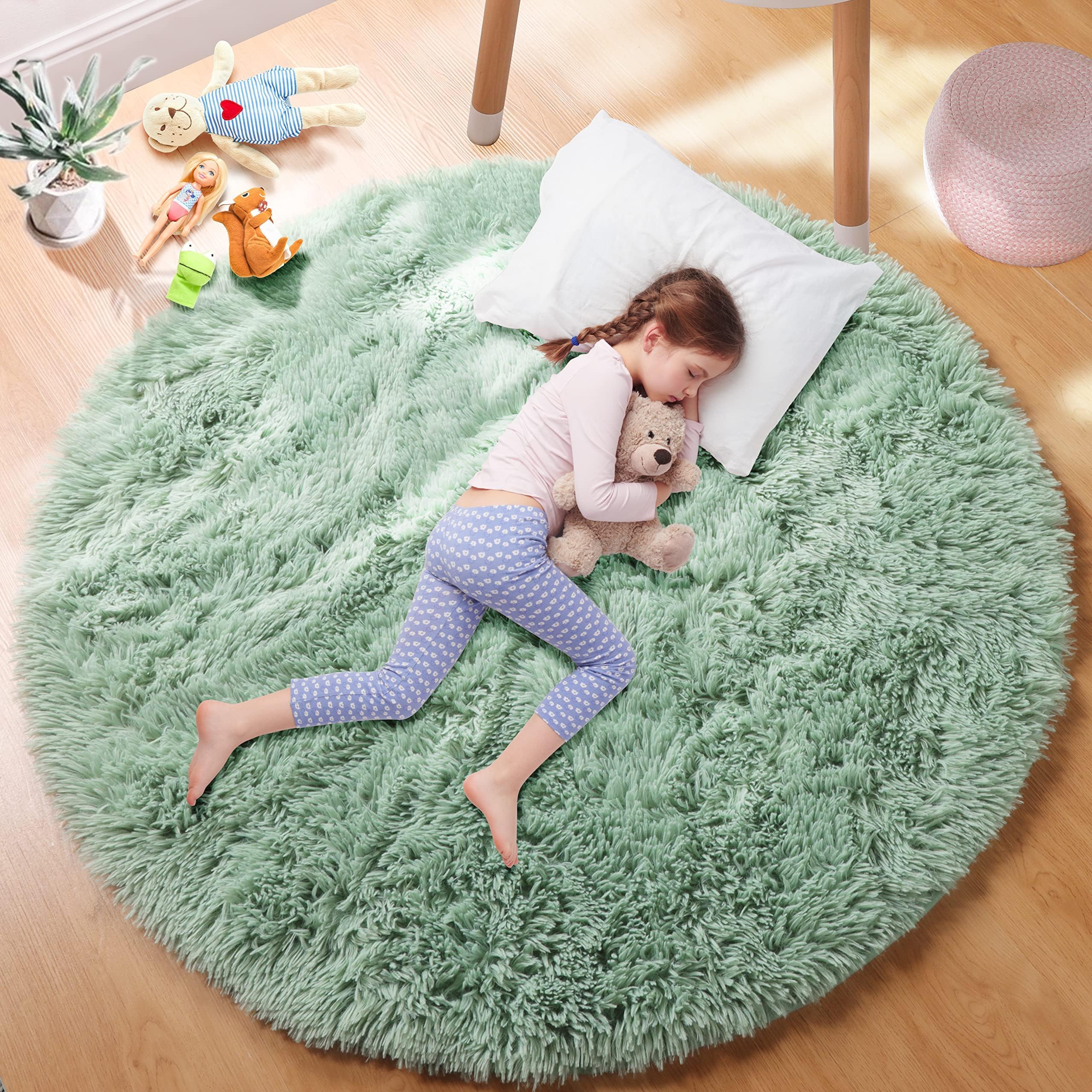 Photo 1 of Sage Green Round Rugs for Boys Bedroom,Shaggy Circle Rug 5Ft for Kids Room,Fluffy Carpet for Classroom Shag Circular Rug for Nursery,Fuzzy Plush Rugs for Teen Dorm,Cute Baby Room Decor