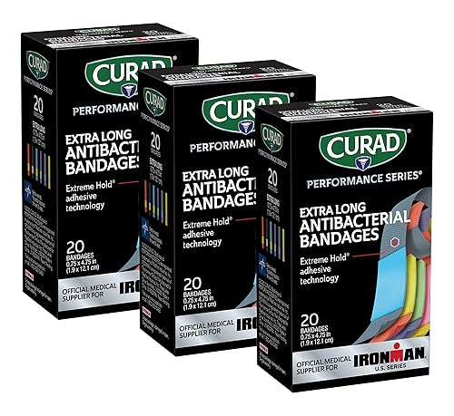 CURAD Performance Series IRONMAN Antibacterial Bandages, Extreme Hold Adhesive Technology, Extra Long Flexible Fabric Bandages for Cuts, Scrapes & Burns, Assorted Colors, 0.75 x 4.75 inches, Pack of 3