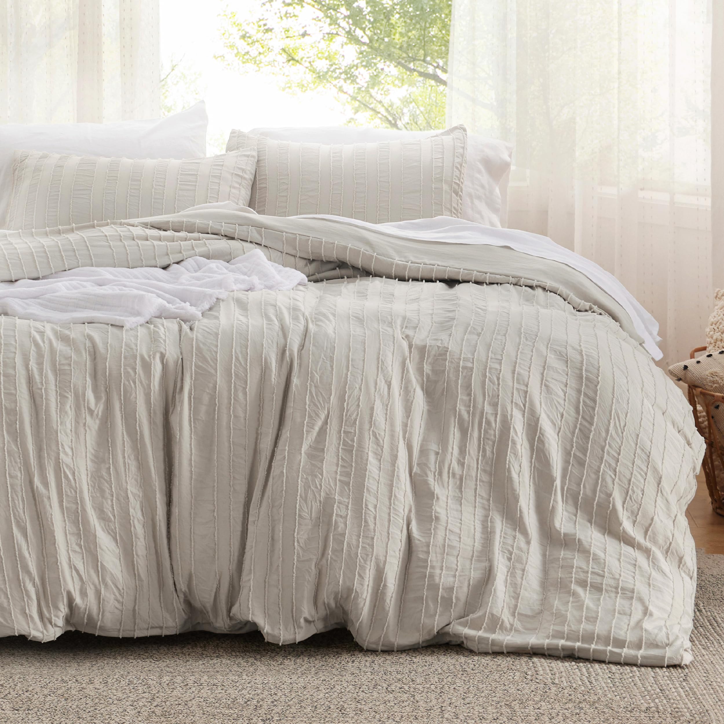 Photo 1 of Bedsure Striped Boho Duvet Cover Queen Size - Tufted Boho Bedding Set, 3 Pieces Shabby Chic Home Bedding for All Seasons, Includes 1 Queen Duvet Cover & 2 Pillowcases (Light Beige, 90" x 90")