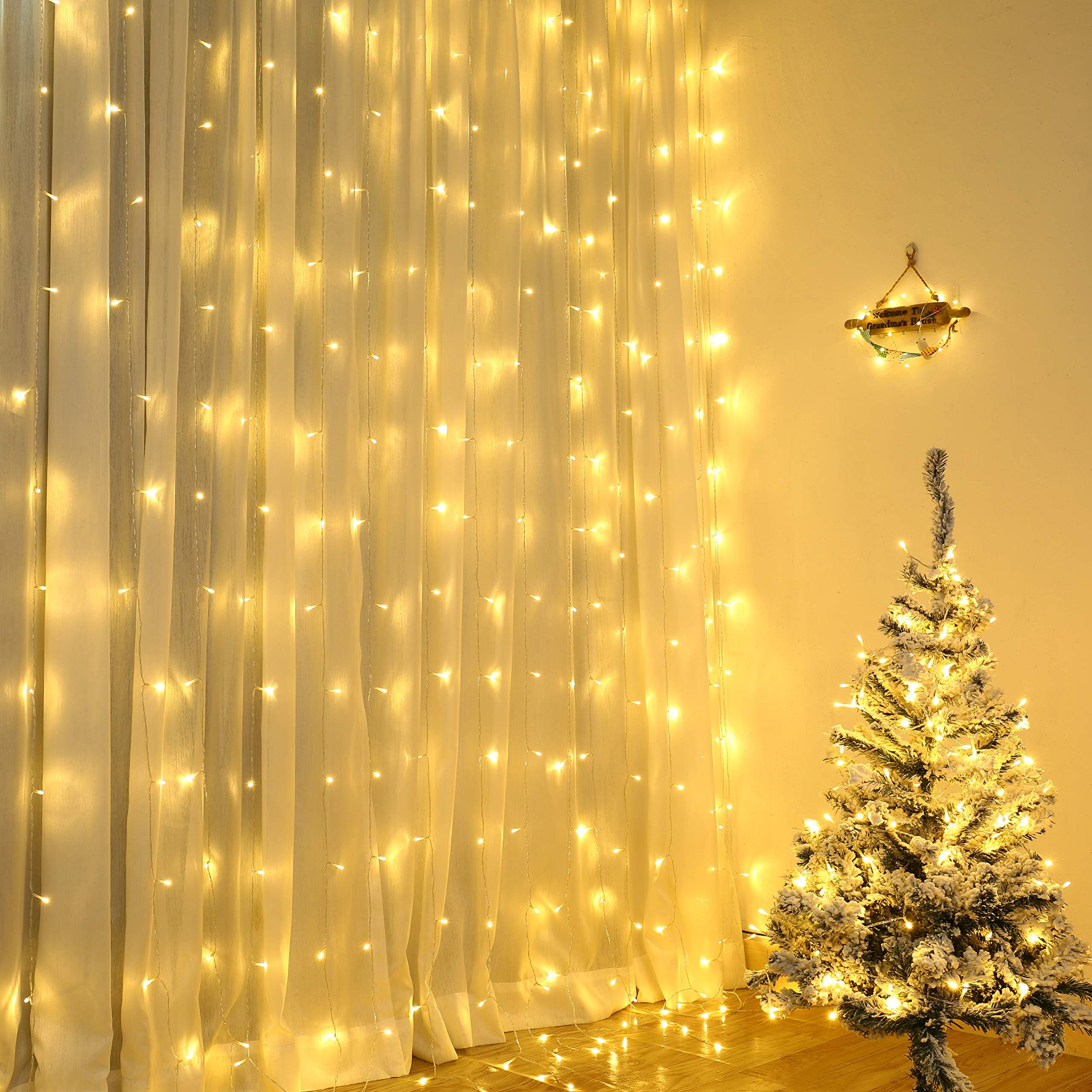 Qedertek Curtain Fairy Lights Mains Powered, 3m X 3m 300 LED Fairy Lights with 8 Lighting Modes for Indoor Outdoor, Party, Garden, Wedding, Valentine, Christmas Decorations (Warm White)
