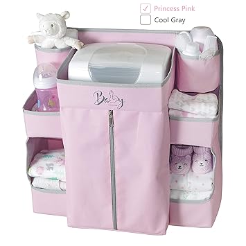 pink crib with changing table