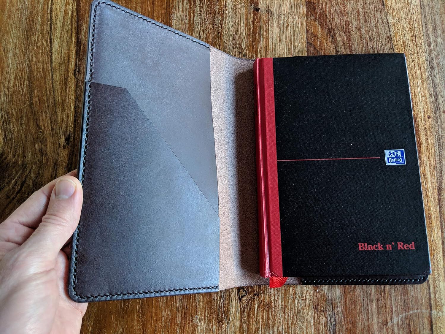 Handmade leather notebook cover for an OXFORD Black n’ Red A4 notebook