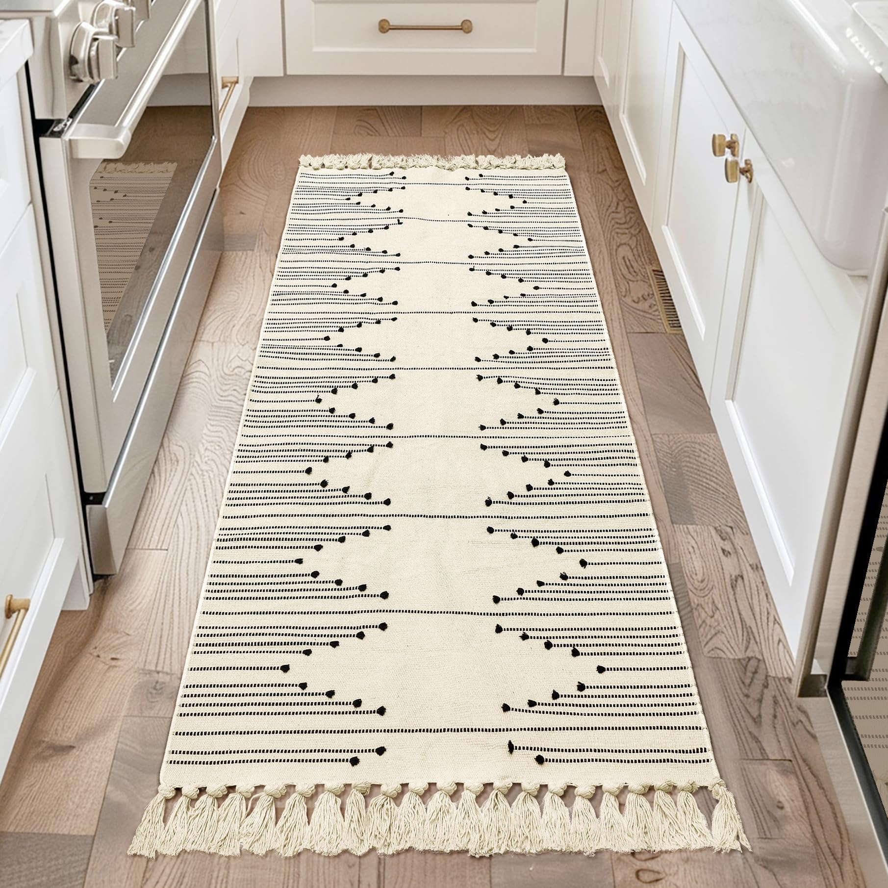 Photo 1 of Tritard Boho Runner Rug 2x6 - Washable Area Rug for Hallway, Lightweight Farmhouse Aztec Cotton Rugs with Tassels Kitchen Bathroom Woven Low Pile Thin Carpet for Entryway, Bedroom, Beige Cream