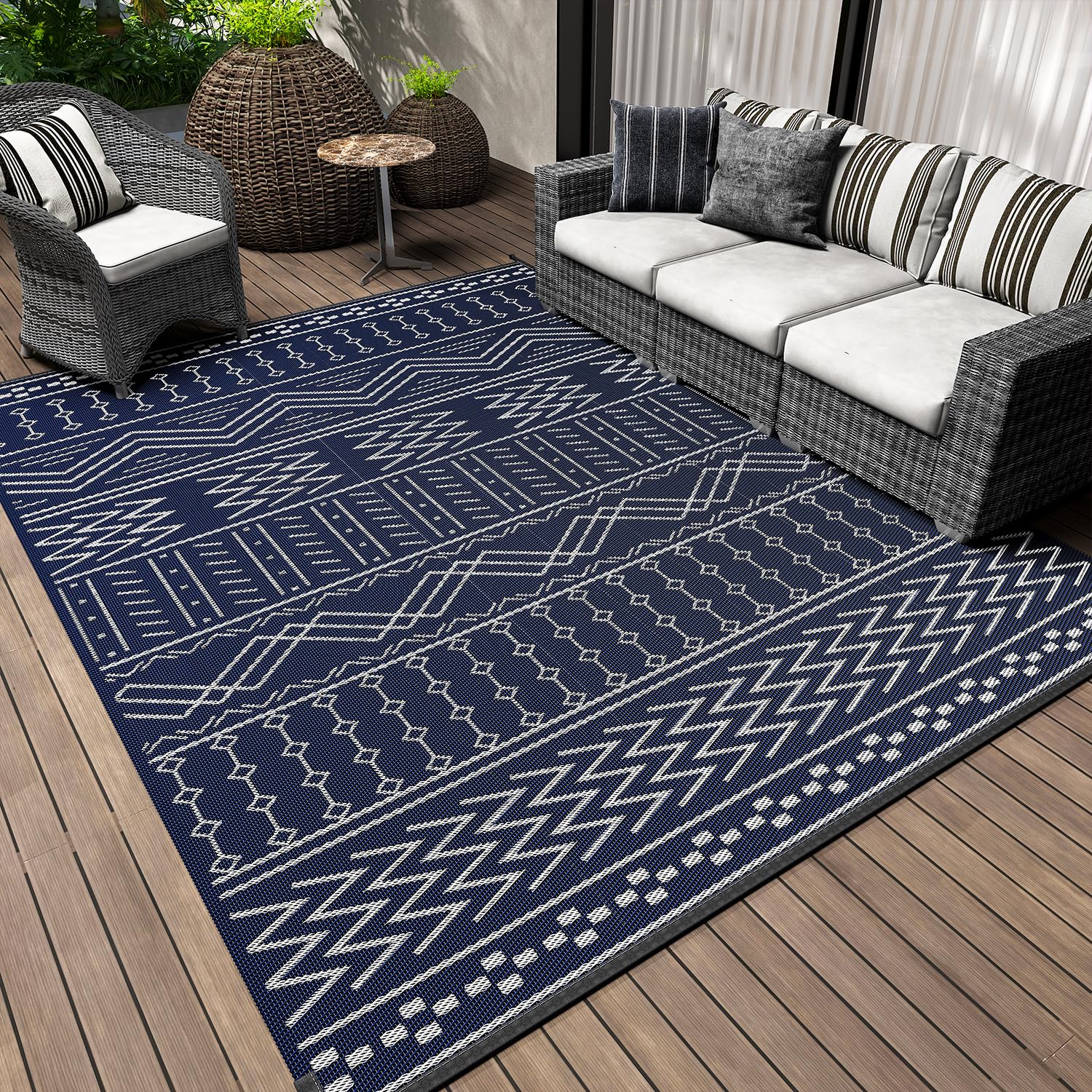 Photo 1 of Outdoor Rug Carpet Waterproof 5x8 ft Patio Rug Mat Indoor Outdoor Area Rug for RV Camping Picnic Reversible Lightweight Plastic Straw Outside Rug for Patio Decor Decoration Boho Rug Navy Blue White