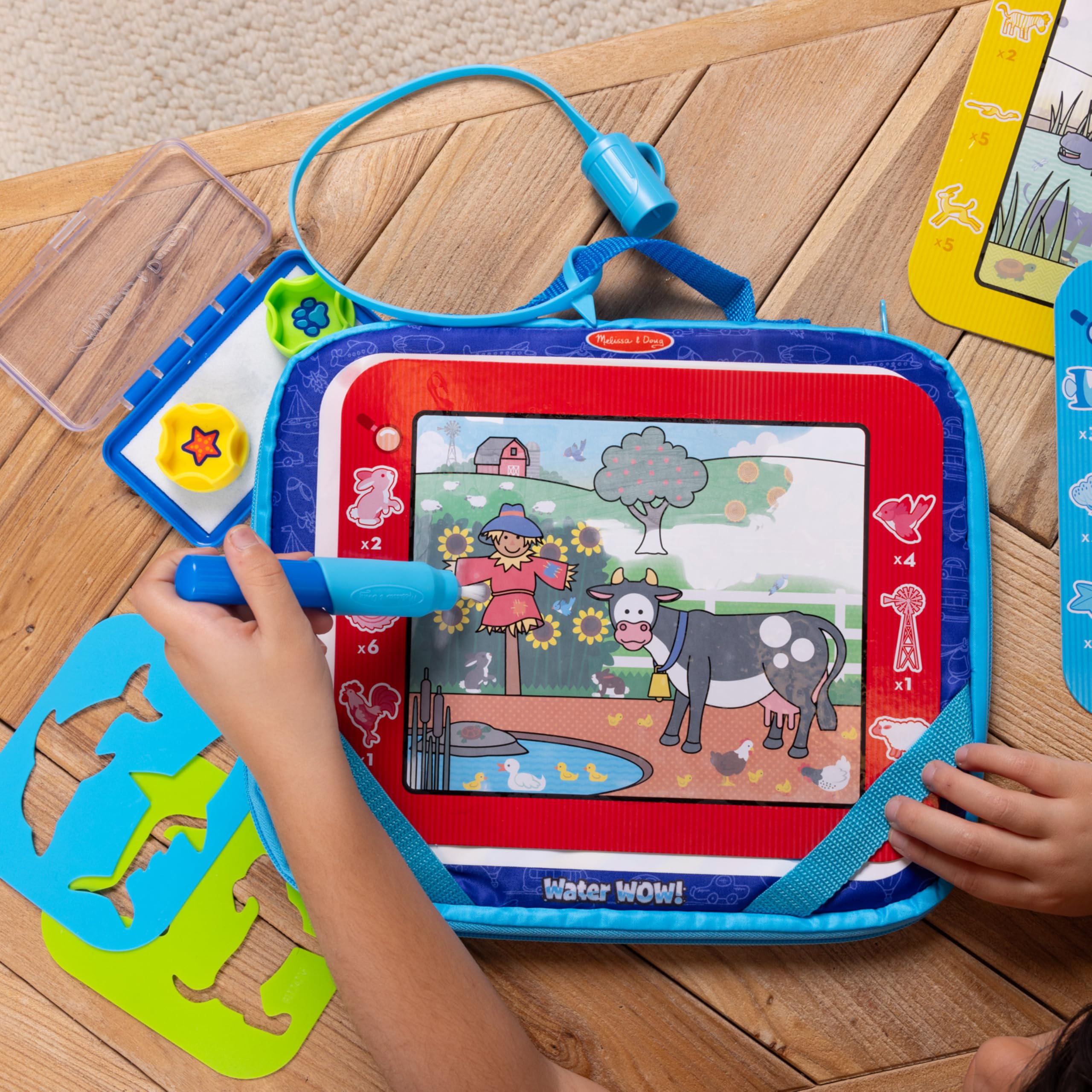 Melissa & Doug Water Wow! Take-Along Reusable Color-Reveal Drawing Set Mess-Free Multi-Activity Pad with Water PenTravel Toy for Toddlers & Kids Ages 3+