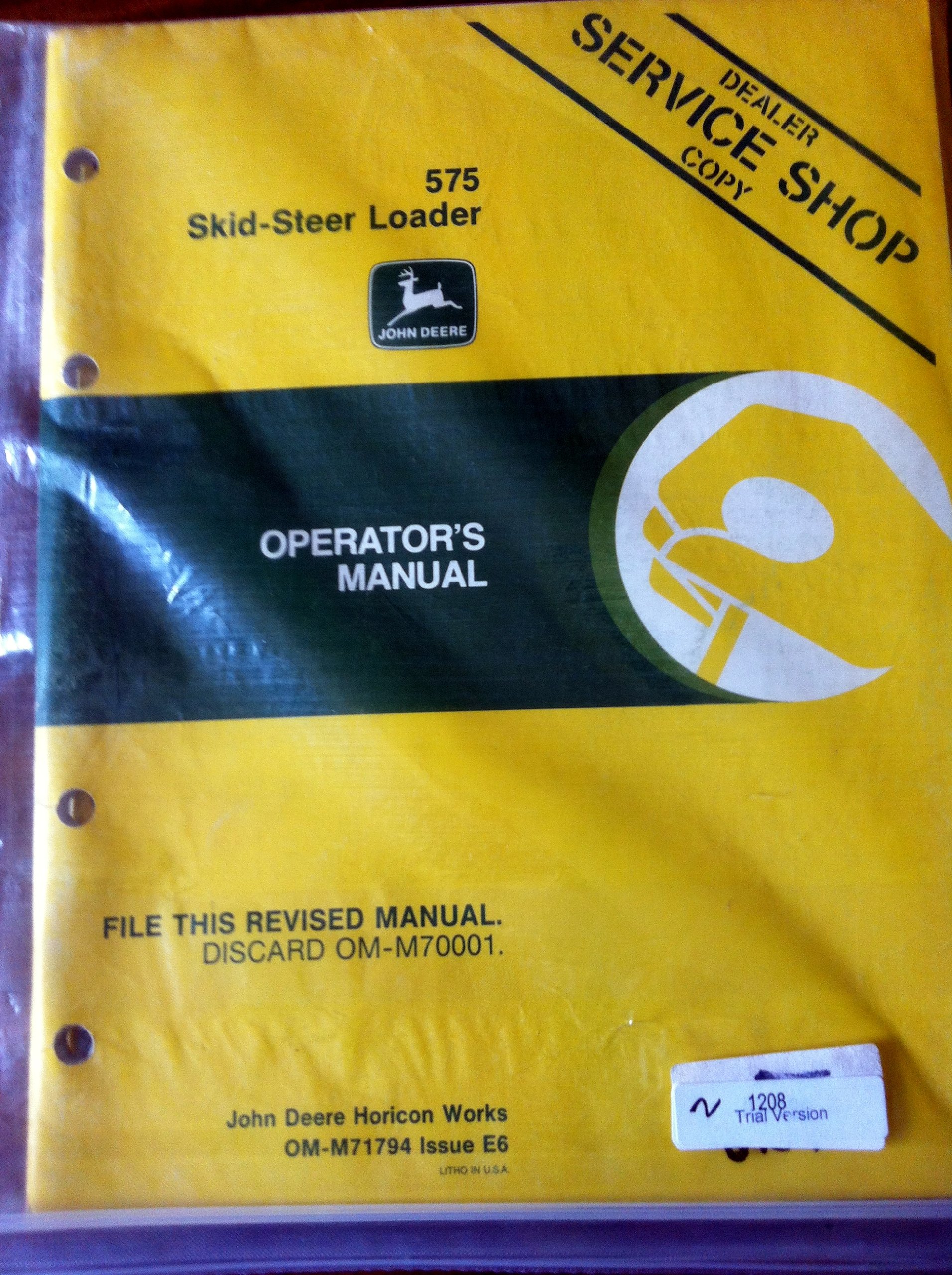 John Deere 575 Skid Steer Loader Operators Manual Paperback – 2012
