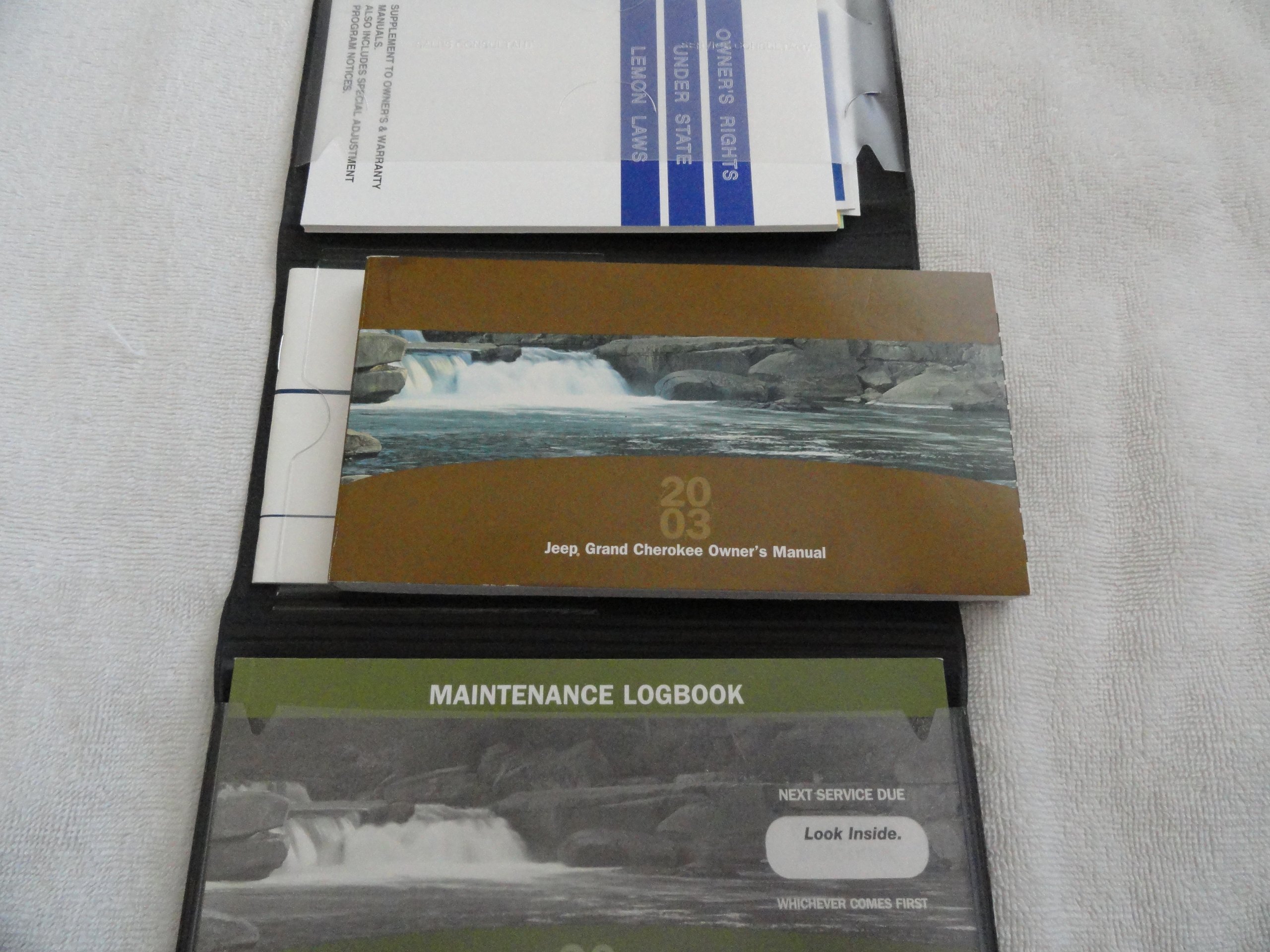 2003 Jeep Grand Cherokee Owners Manual Paperback – 2003