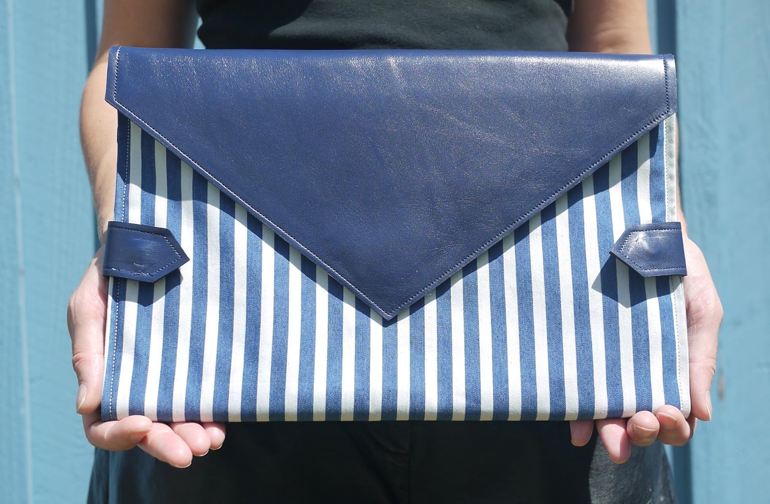 blue and white clutch