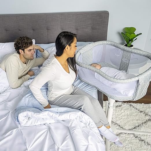 bassinet near bed