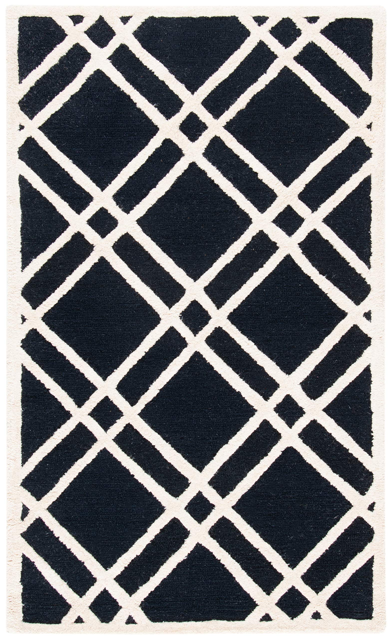 Safavieh Modern Indoor Hand Tufted Accent Area Rug, Cambridge Collection, CAM142, in Black / Ivory, 61 X 91 cm for Living Room, Bedroom or Any Indoor Space