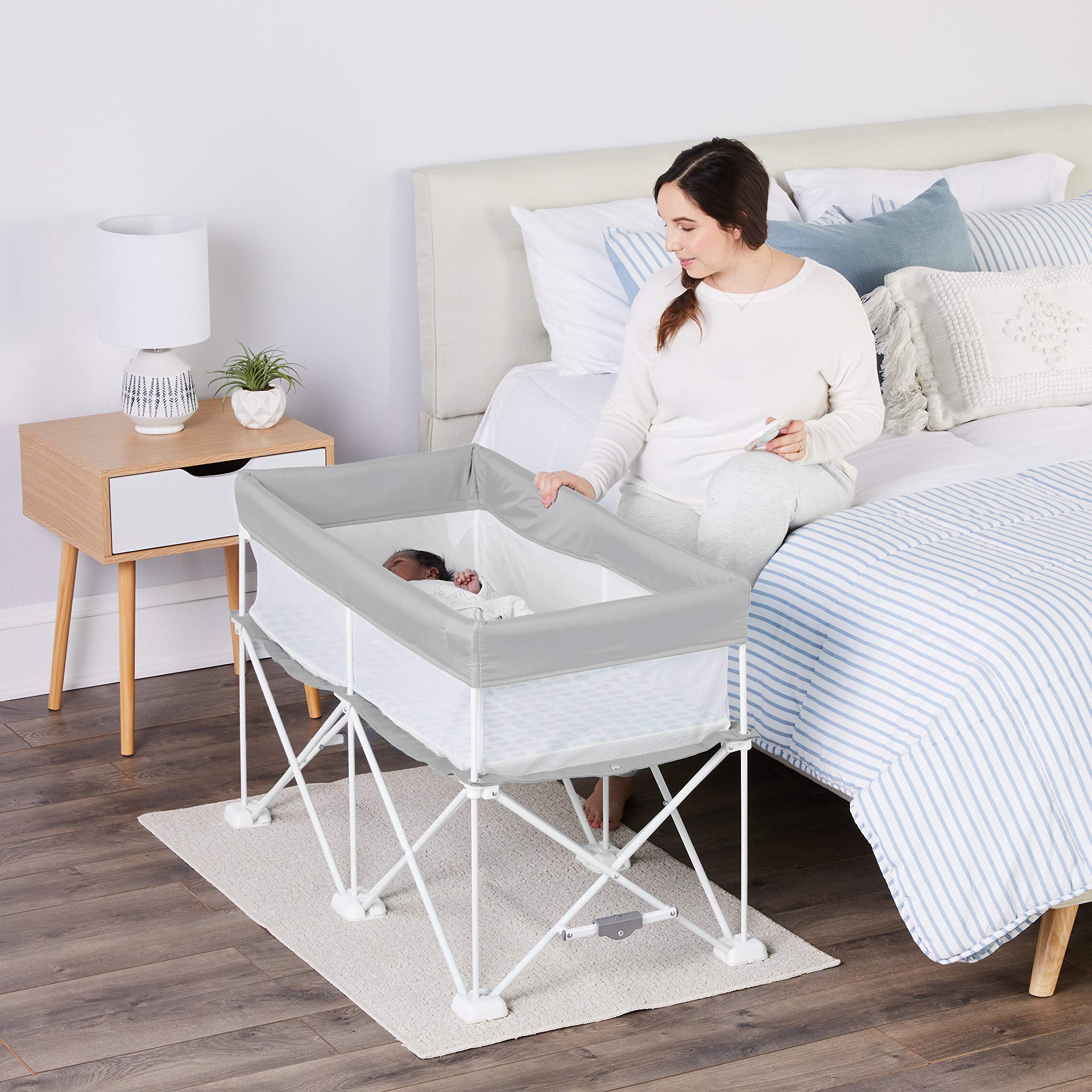Photo 1 of Regalo My Crib Portable Infant Bassinet, Includes Design Padded Insert, Travel Carry Bag, Support Tubes, Step Safety Locking Mechanism, Grey