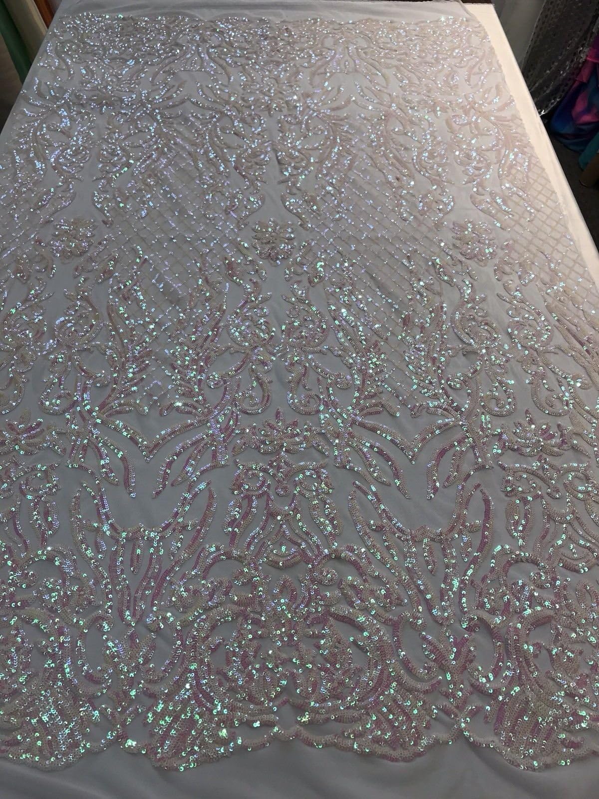 IRIDESCENT WHITE SEQUIN DAMASK DESIGN EMBROIDERY ON A 4 WAY STRETCH MESH-BY YARD