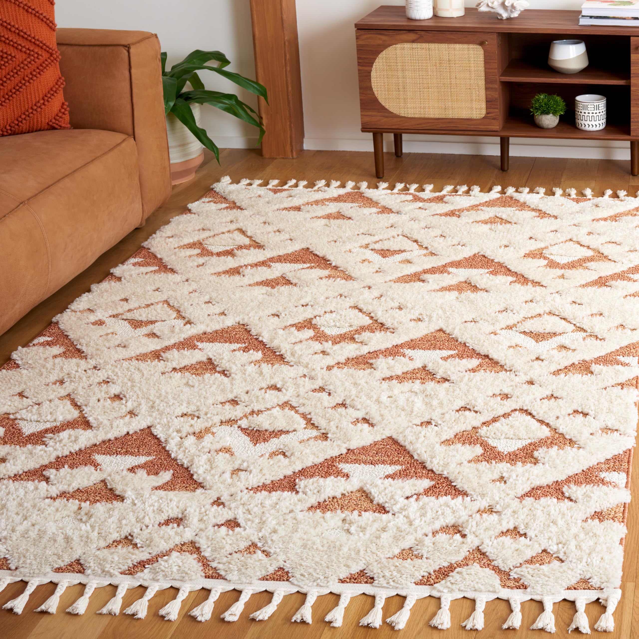 SAFAVIEH Moroccan Tassel Shag Collection Area Rug - 6'7" x 9'2", Ivory & Brick Rust, Contemporary Design, Ideal for High Traffic Areas in Living Room, Bedroom & Dining Room (MTS688P-6) Image