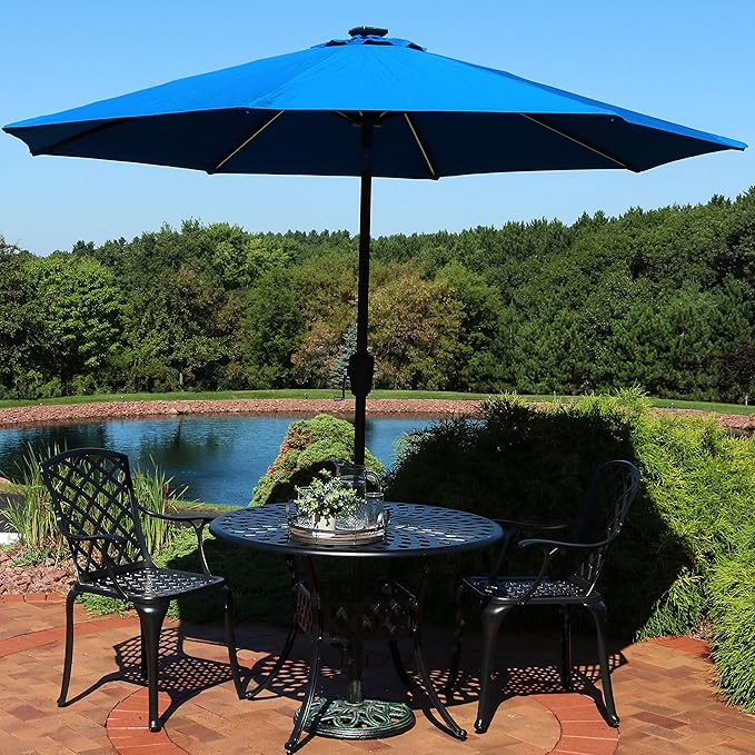 Amazon Com Sunnydaze Sunbrella Patio Umbrella With Solar Lights 9 Foot Tilting Outdoor Market Umbrella For Pool Deck Garden Porch Or Yard Led Light Bars And Sunbrella Material Pacific