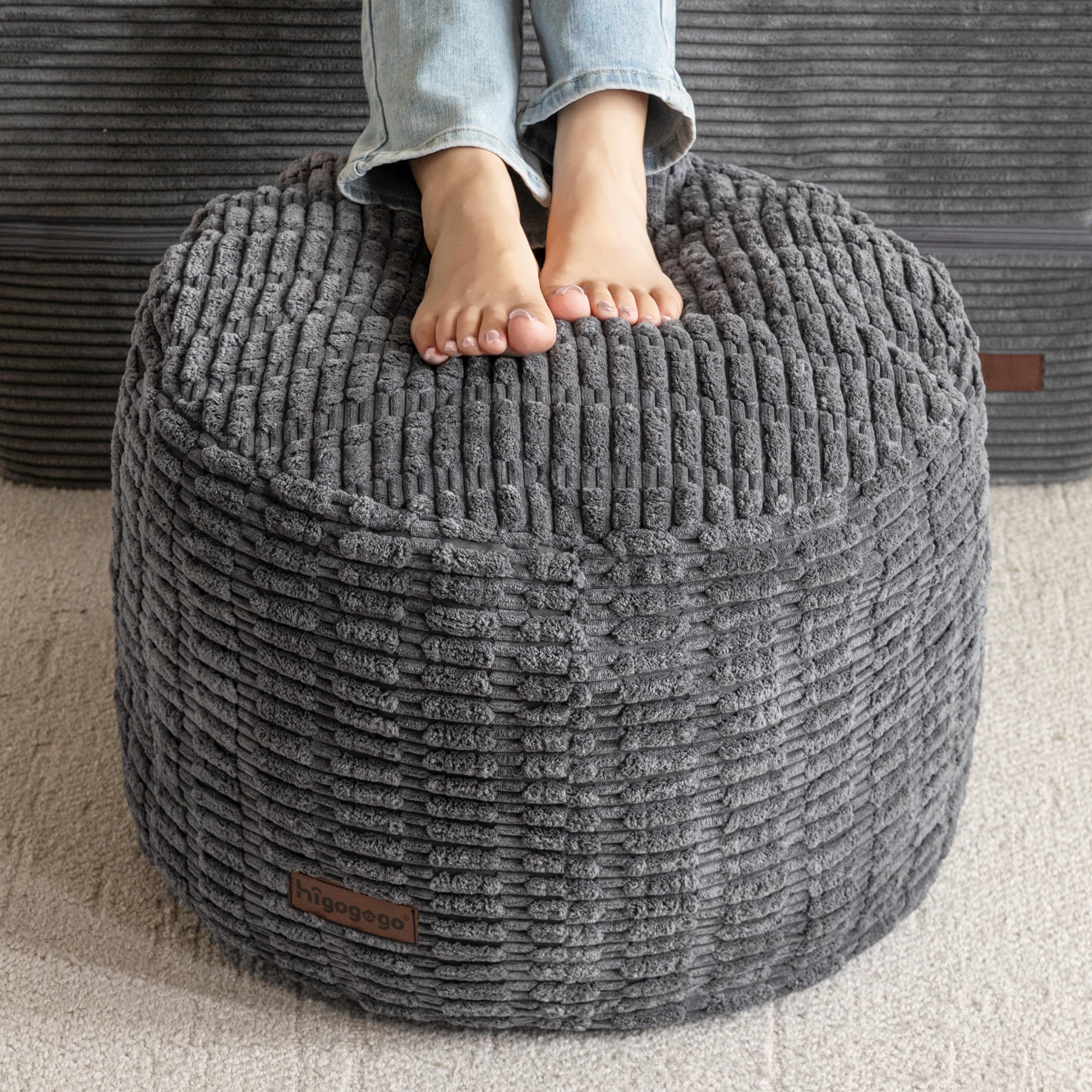 Photo 1 of HIGOGOGO Pouf Ottoman Stuffed Round Modern Foam Filled Foot Rest Poufs for Living Room Chair Decorative 26 X 18 Inches Boho Relax Stool for Wedding Christmas Party, Dark Grey