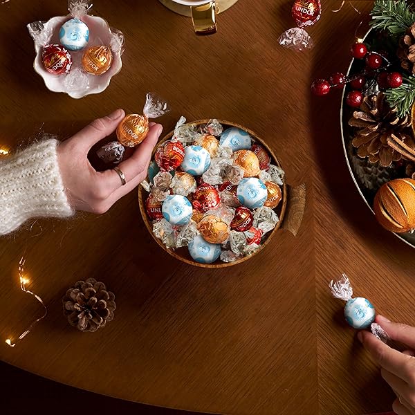 LINDT LINDOR HOLIDAY ASSORTED CHOCOLATE CANDY TRUFFLES WITH SMOOTH, MELTING TRUFFLE CENTER, 15.2 OZ. BAG