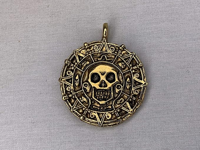 Pirates Of The Caribbean Cursed Aztec Coin Pendant Solid Metal Gold At Amazon S Entertainment Collectibles Store Pirates Of The Caribbean Cursed Aztec Coin Pendant Solid Metal Gold At Amazon S Entertainment Collectibles Store