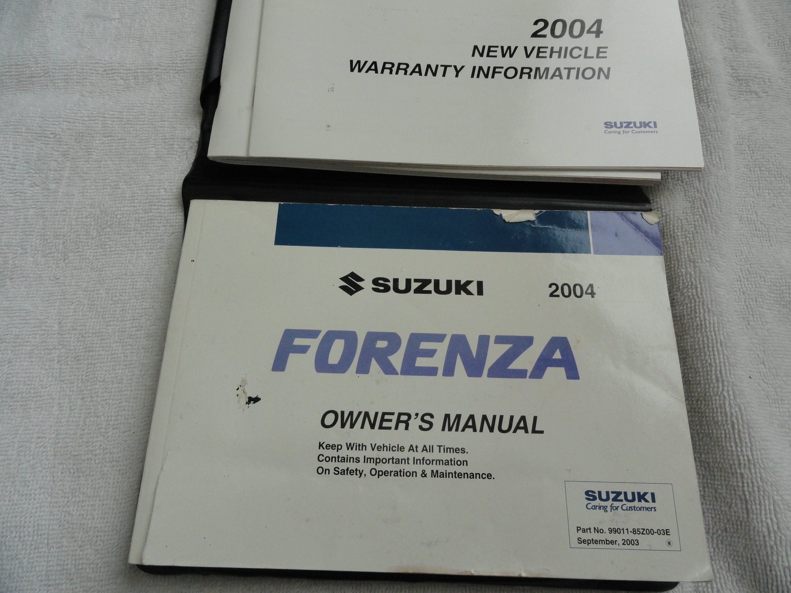 2004 Suzuki Forenza Owners Manual Paperback – 2004