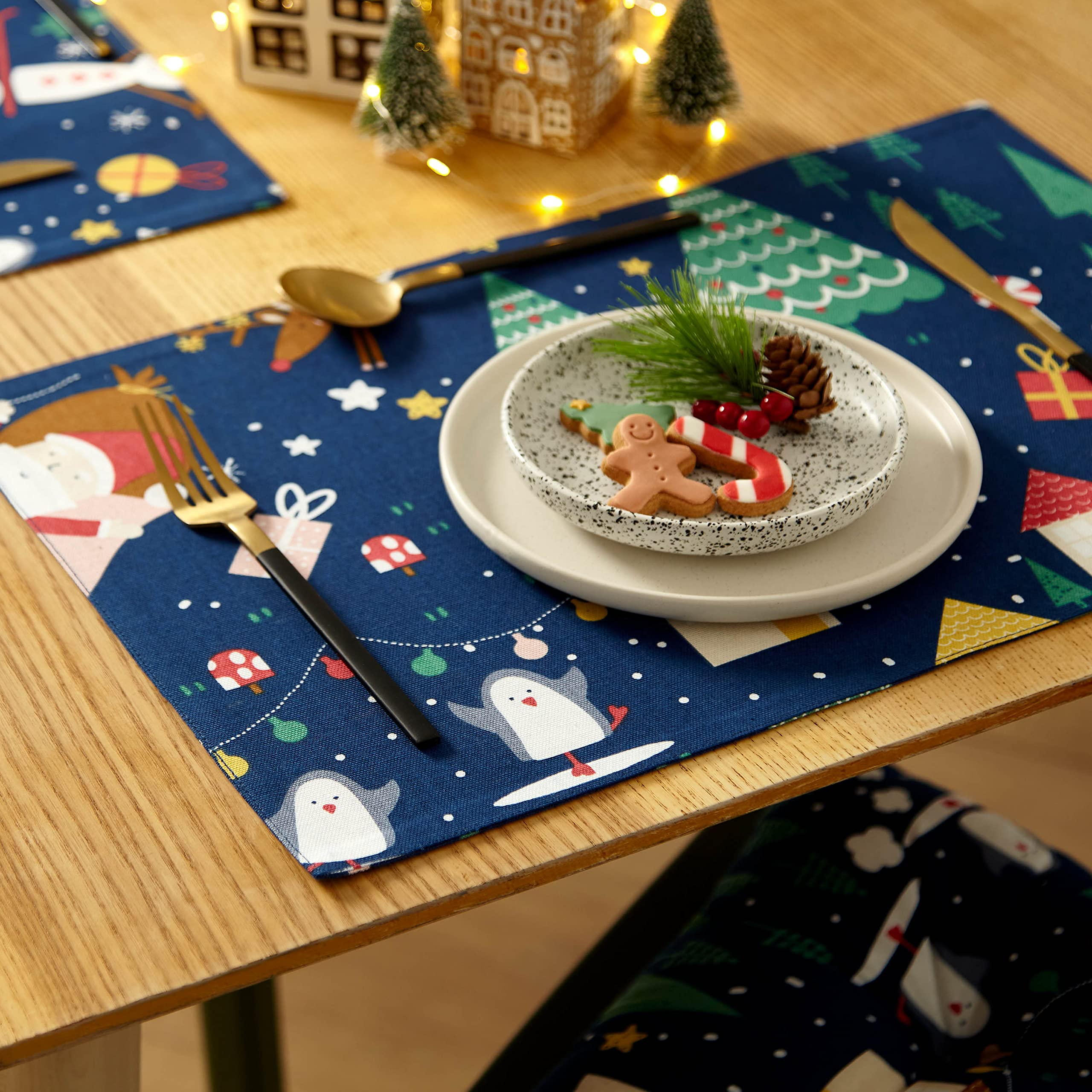 Catherine Lansfield Dining Santa's Christmas Wonderland Wipe Clean 30x46 cm Placemat Pair Navy