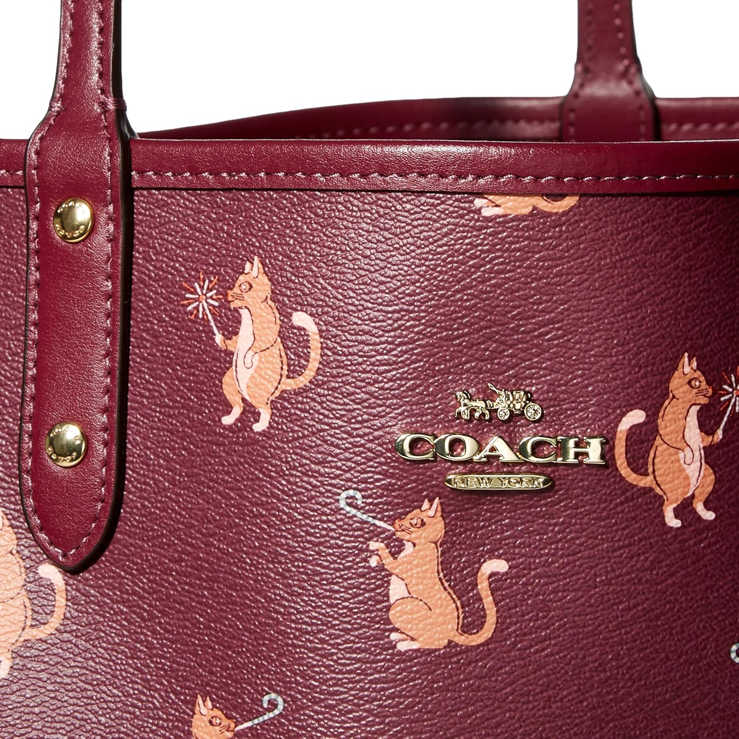 coach cat purse
