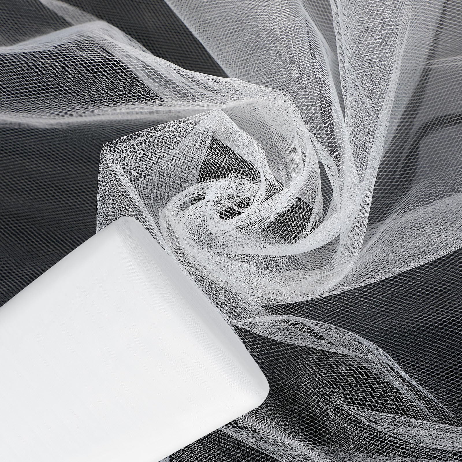 Photo 1 of Timgle Tulle Fabric Rolls Bulk 54 Inch by 100 Yards (300 Ft) Tulle Ribbon Netting Fabric Spool Bolt for DIY Crafts Tutu Skirt Christmas Baby Shower Birthday Party Wedding Decorations(White)
