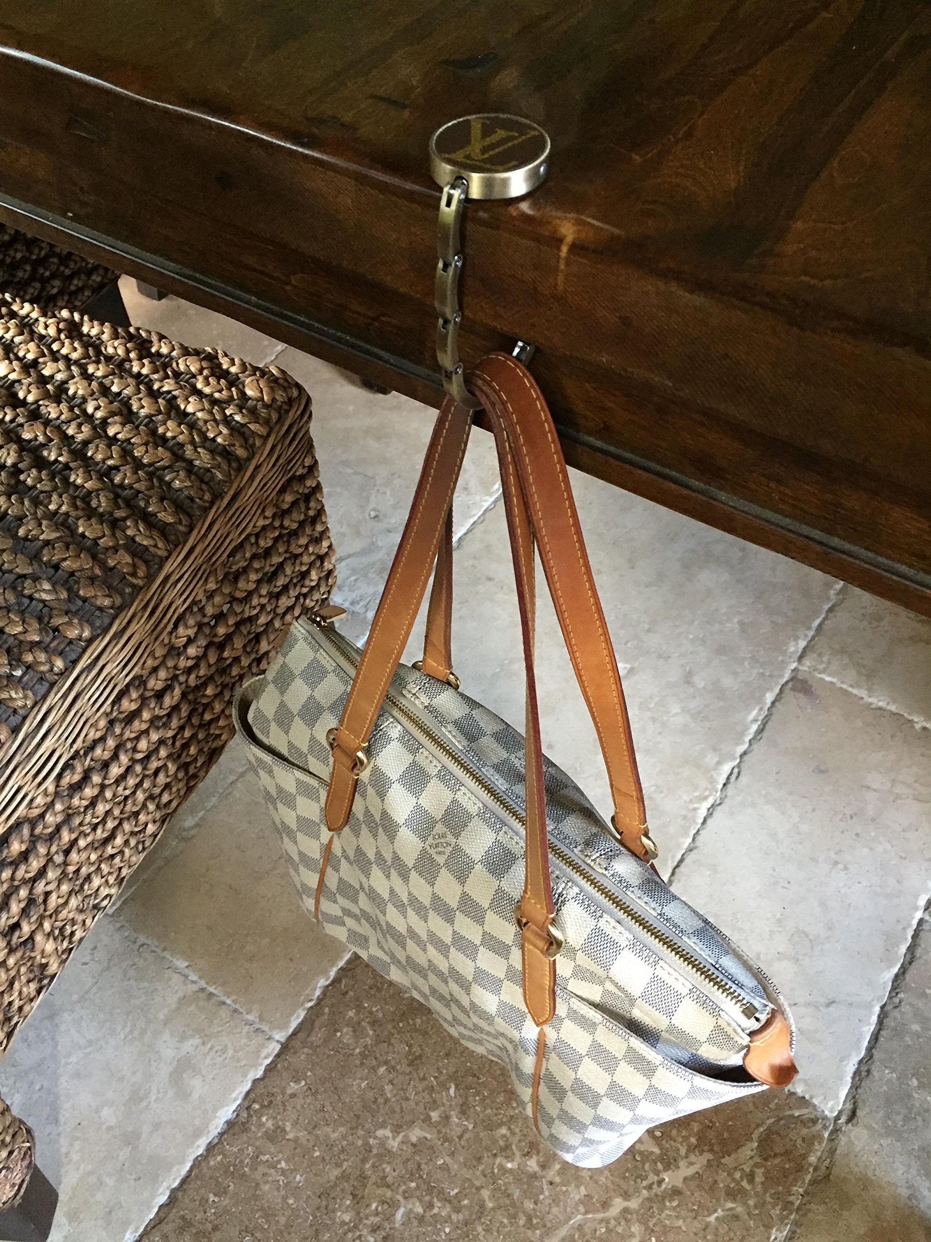 Handcrafted foldable purse hook fashioned with authentic repurposed Louis Vuitton monogram