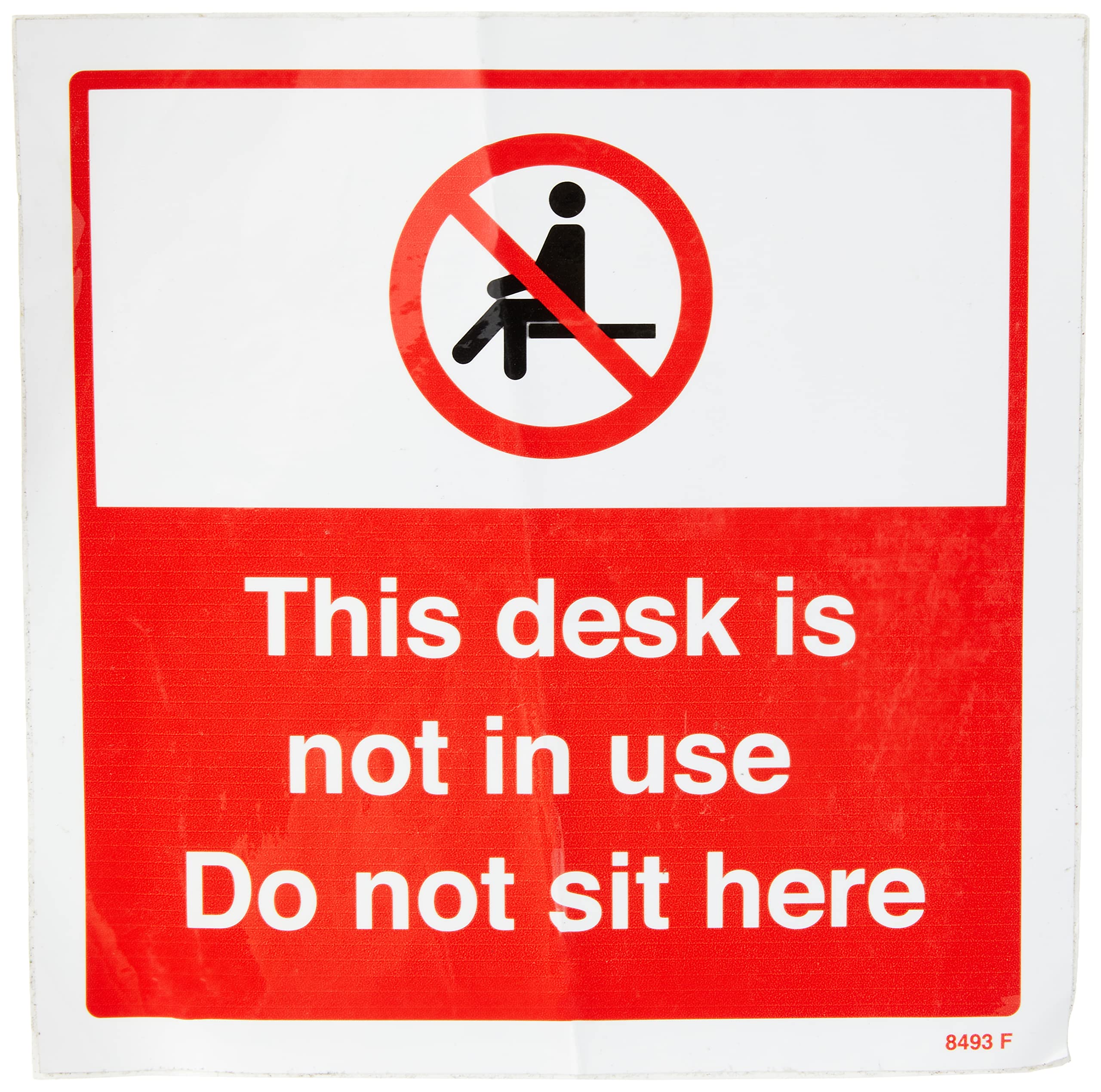 This desk is not in use Do not sit here