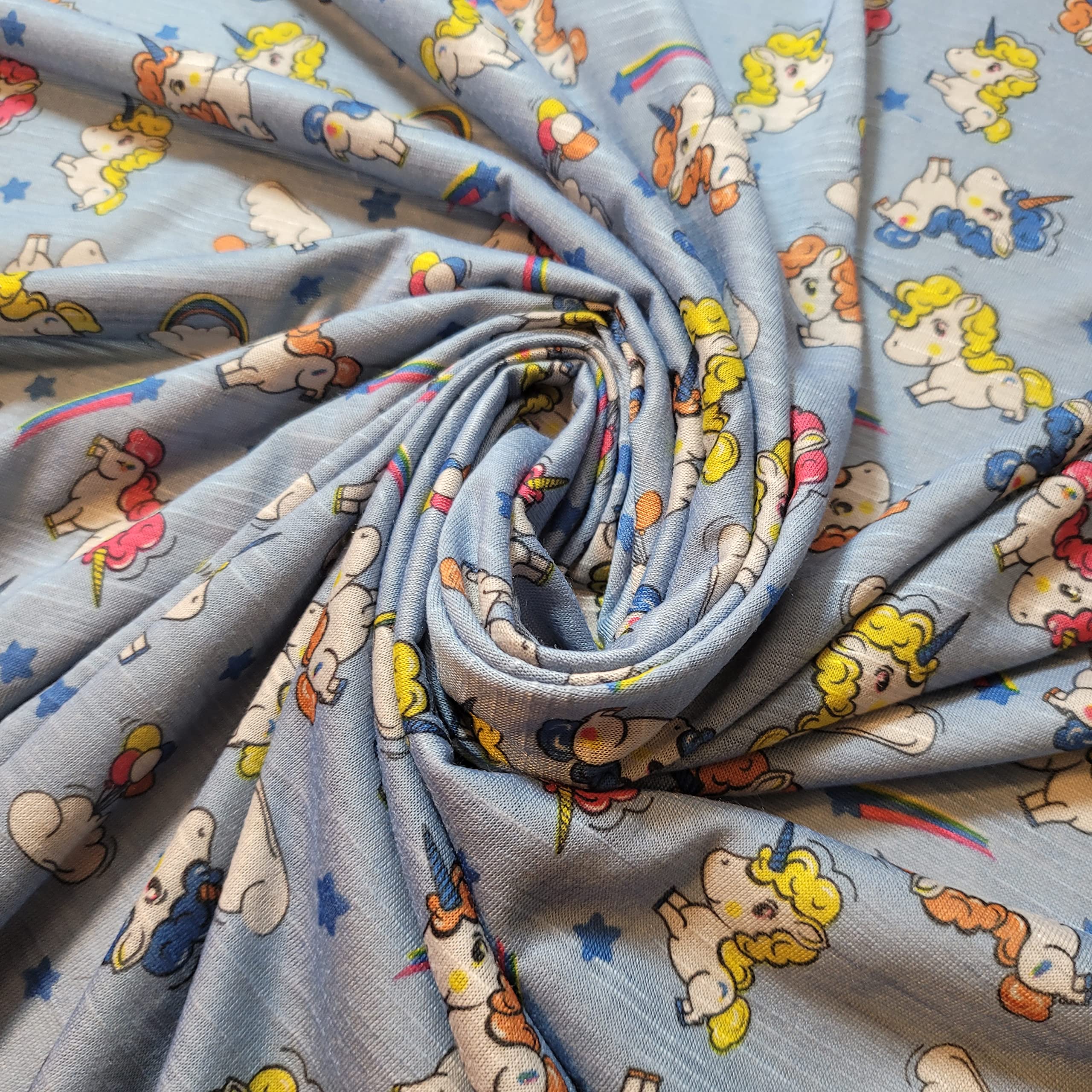 Soft Printed Cotton Jersey Stretch Knit Fabric – Ideal for T-Shirts, Babywear, Dressmaking & Crafts | 58" (150cm) Wide | Sold Per Meter (Pre-Cut) (New Blue Little Pony) — image 1