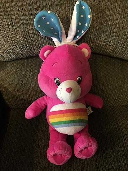 pink care bear with heart and rainbow
