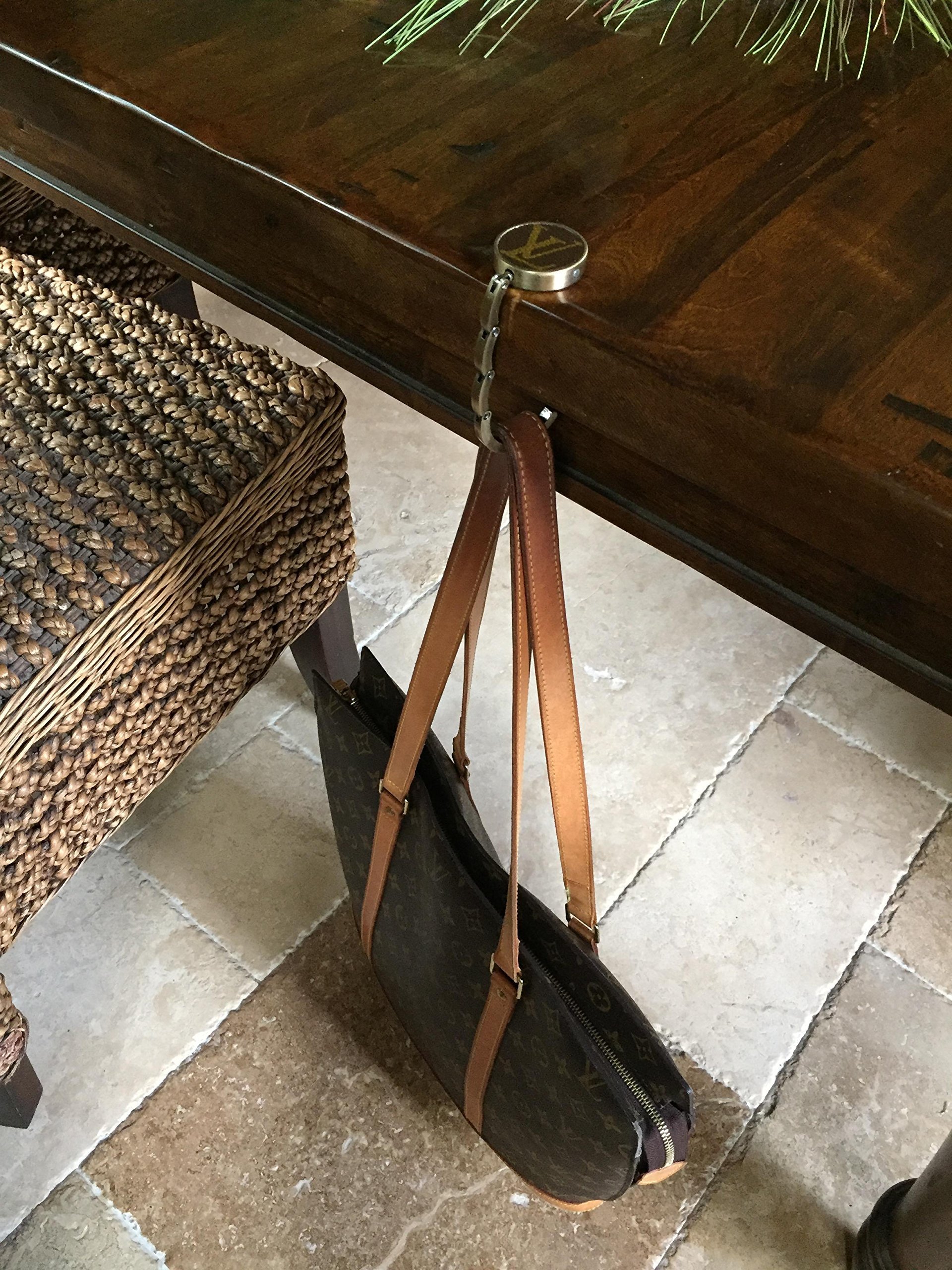 Handcrafted foldable purse hook fashioned with authentic repurposed Louis Vuitton monogram