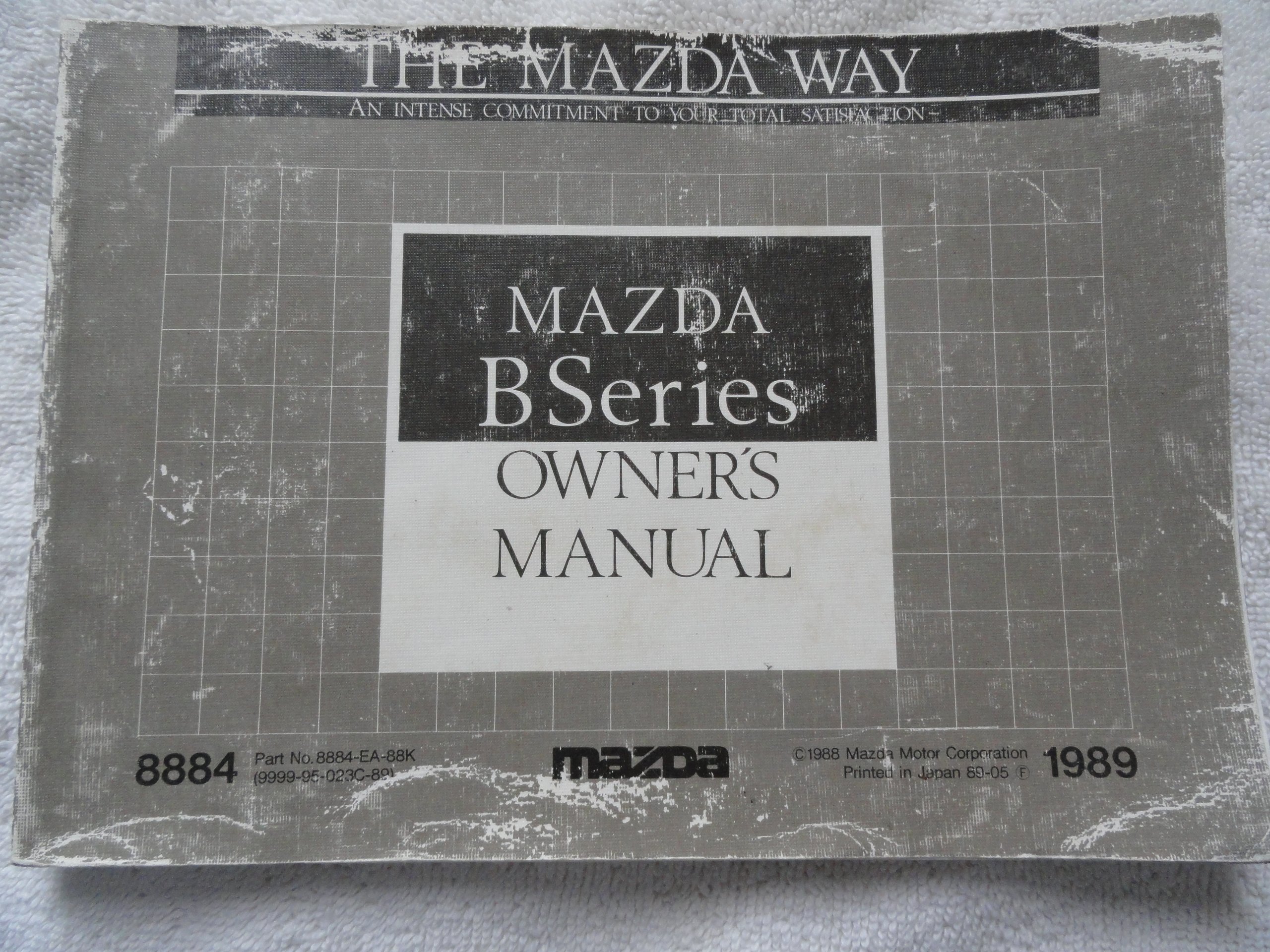 1989 Mazda B Series Truck Owners Manual Paperback – 1989