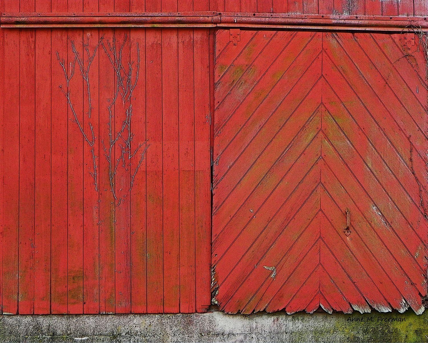 Patterns in Red. A fine art photograph of red sliding wagon doors on an old barn. Wonderful red color and patterns.