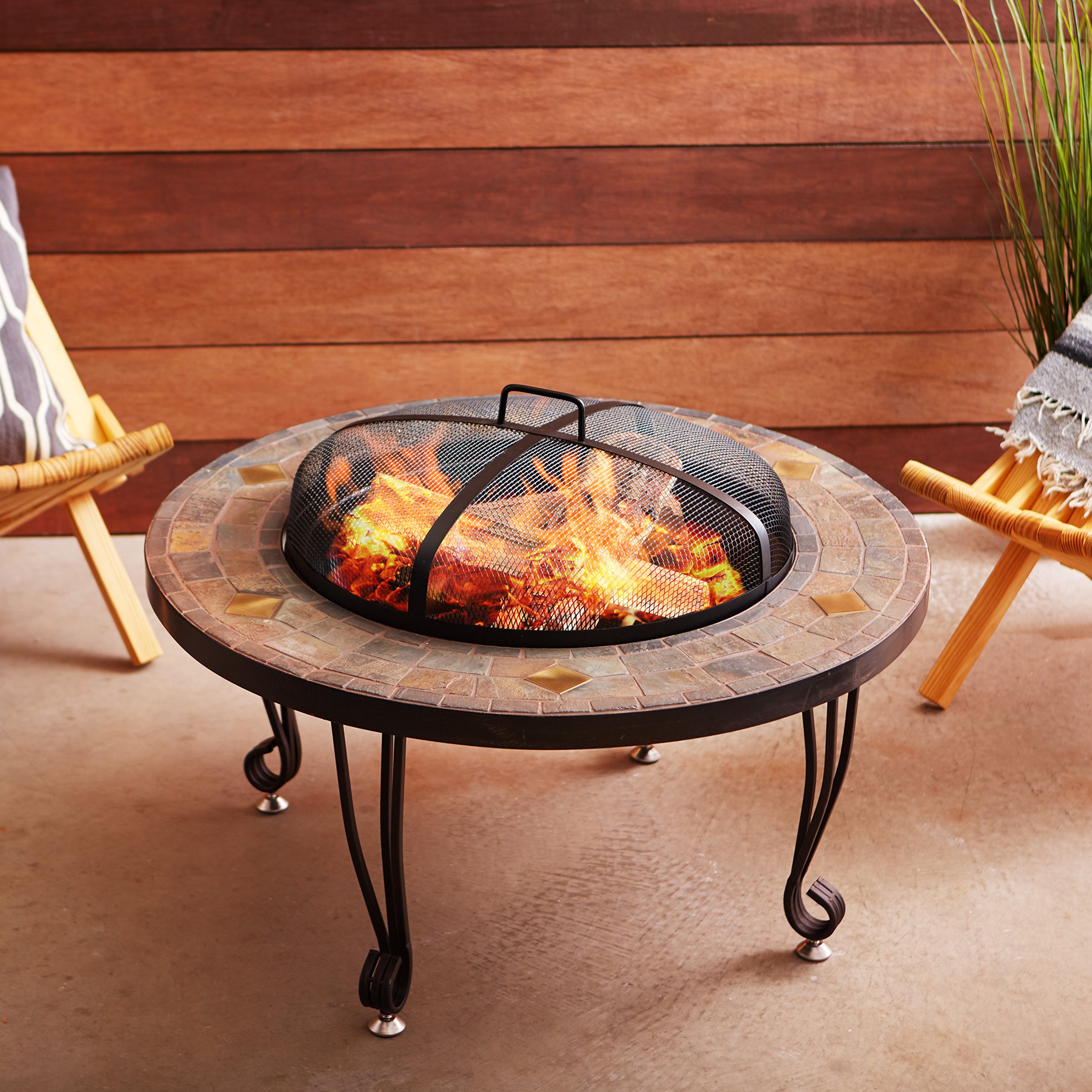 AmazonBasics 34-Inch Natural Stone Fire Pit with Copper Accents