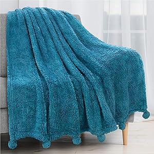 PAVILIA Plush Sherpa Throw Blanket with Pom Pom Fringe, Blue Turquoise | Fluffy Fleece Tassel Throw for Sofa Bed Couch | Soft Fuzzy Shaggy Lightweight Decorative Blanket | 50 x 60 in