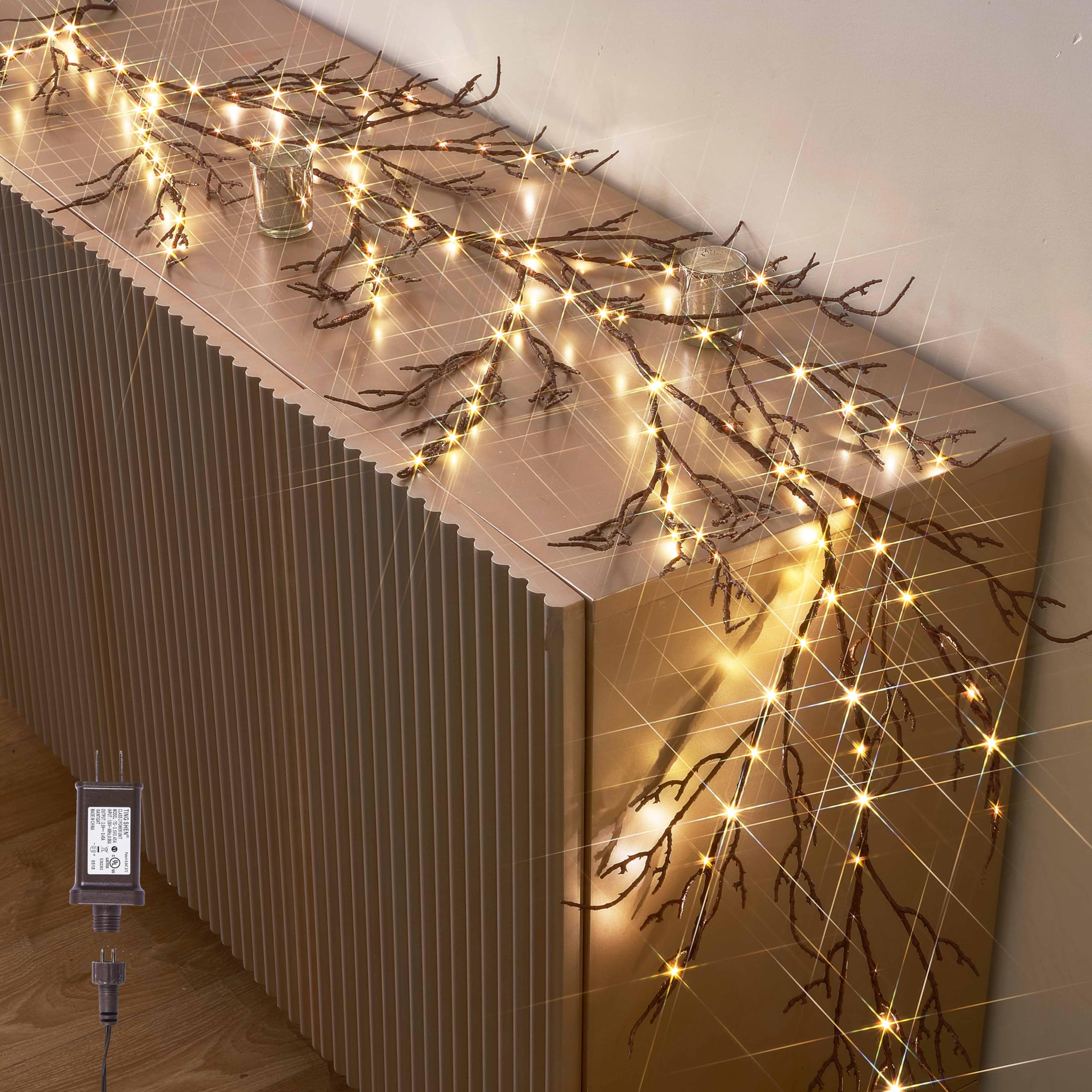Photo 1 of Hairui Lighted Brown Garland 6FT 120 LED Fairy Lights Plug in, Twig Vine with Lights for Christmas Fireplace Mantle Table Decoration Indoor Outdoor