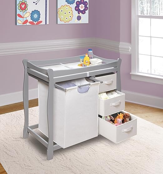sleigh style baby changing table with 6 storage baskets and pad