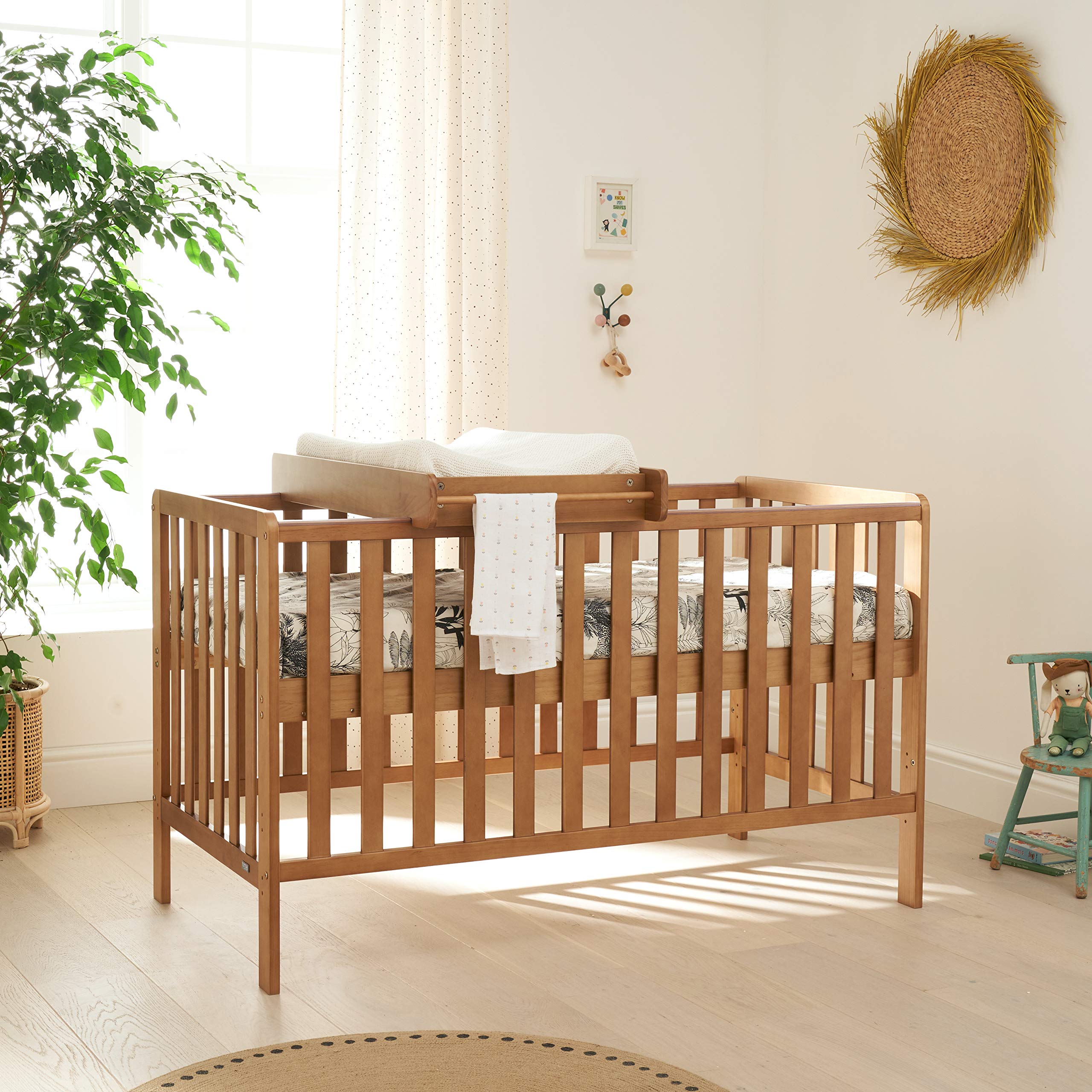 rio cot bed with mattress and cot top changer