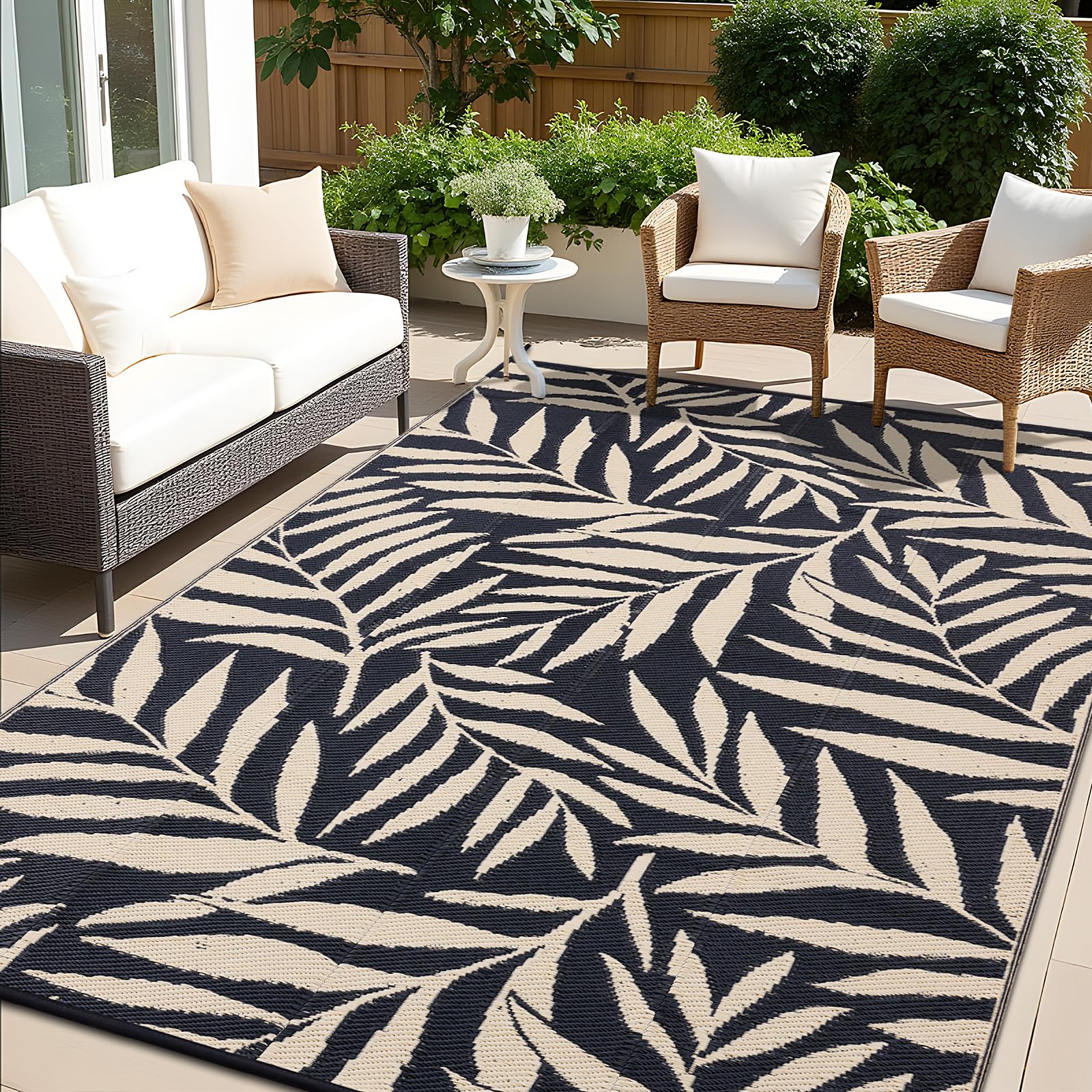 Photo 1 of OLANLY Waterproof Outdoor Rug 6x9 ft, Reversible Outdoor Plastic Straw Rug with Leaf Pattern, RV Mat, Indoor Outdoor Carpet for Patio, Camping, Balcony, Deck, Backyard, Black & Beige