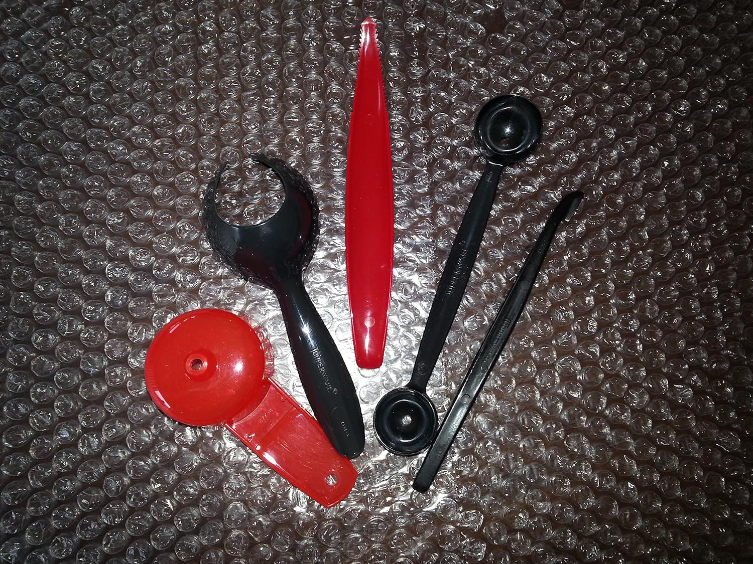 Tupperware (Black and Red) Gadgets Lot of 5, Lettuce Core, Strainer, Egg Lifter, Citrus Peeler and Melon Baller.