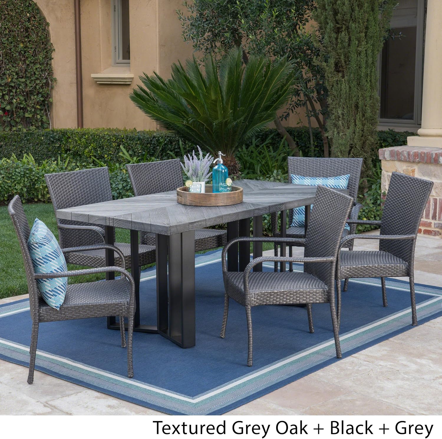 Amazon Com Christopher Knight Home Fiona Outdoor 7 Piece Grey Wicker Dining Set With Textured Grey Oak Finish Light Weight Concrete Dining Table Garden Outdoor